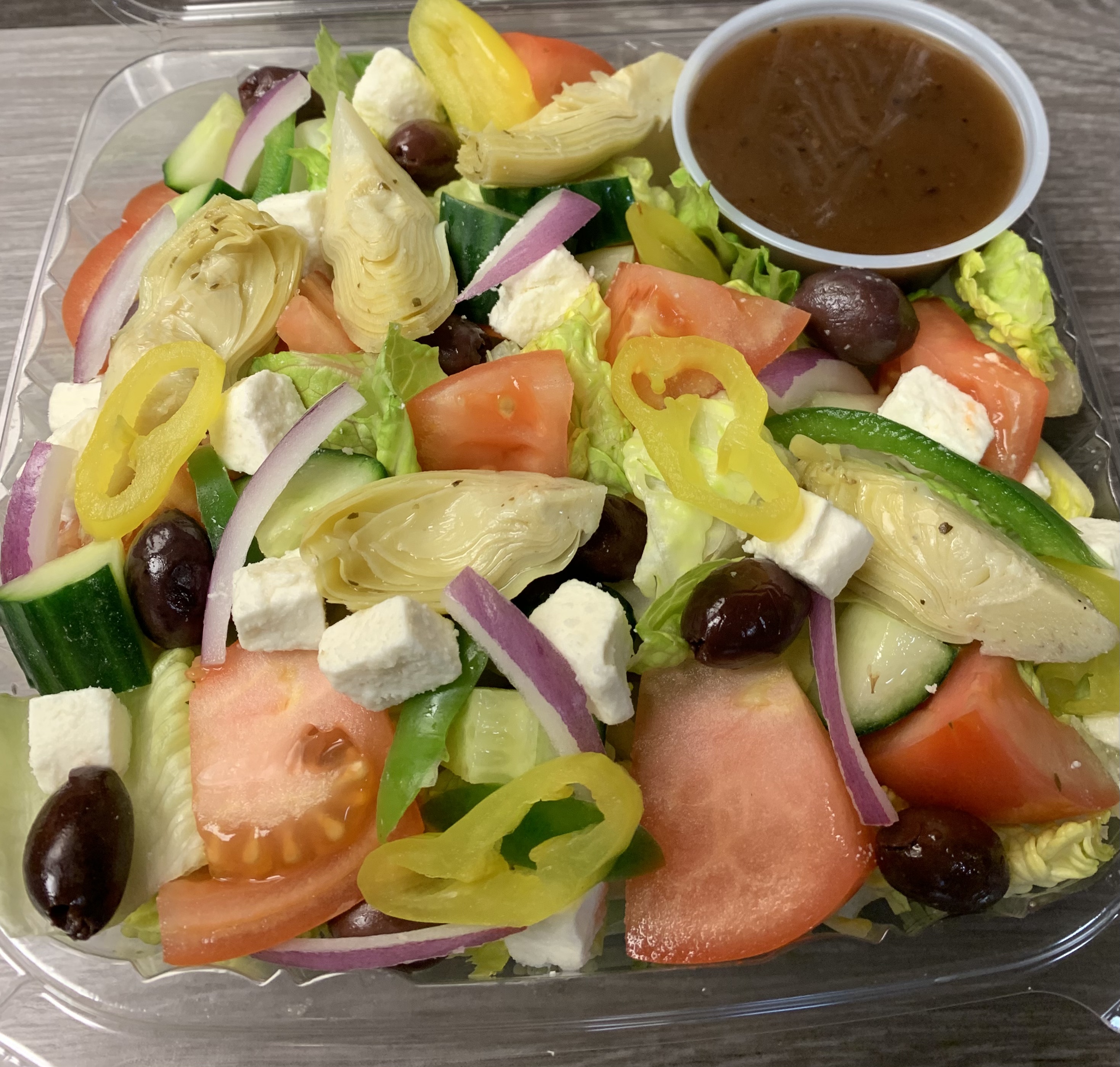 Order Greek Salad food online from Fountain Cafe store, Oakland on bringmethat.com