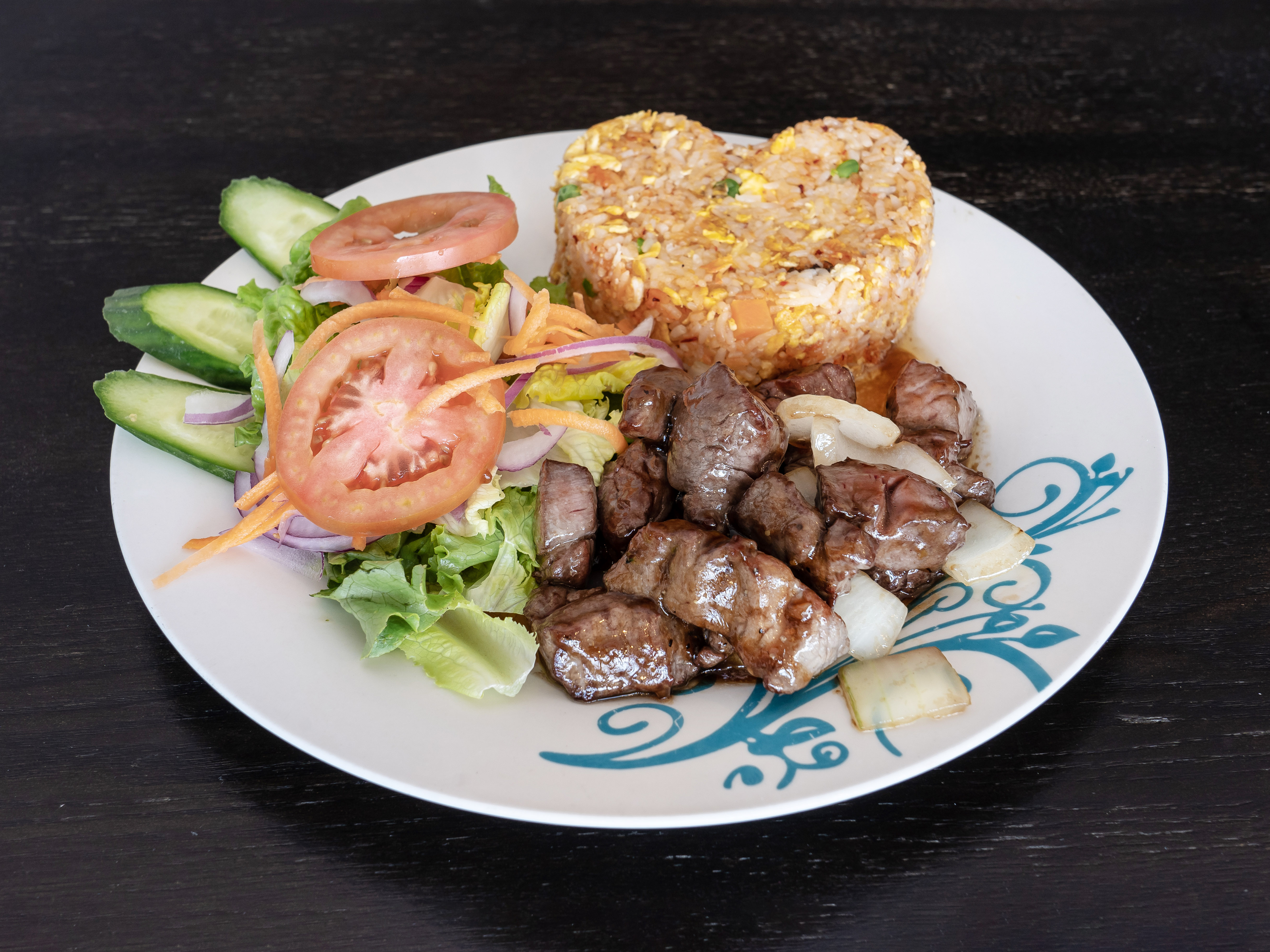 Order Rice with Shaken Fillet Mignon(Bo Luc Lac) food online from Pholicious store, Fountain Valley on bringmethat.com