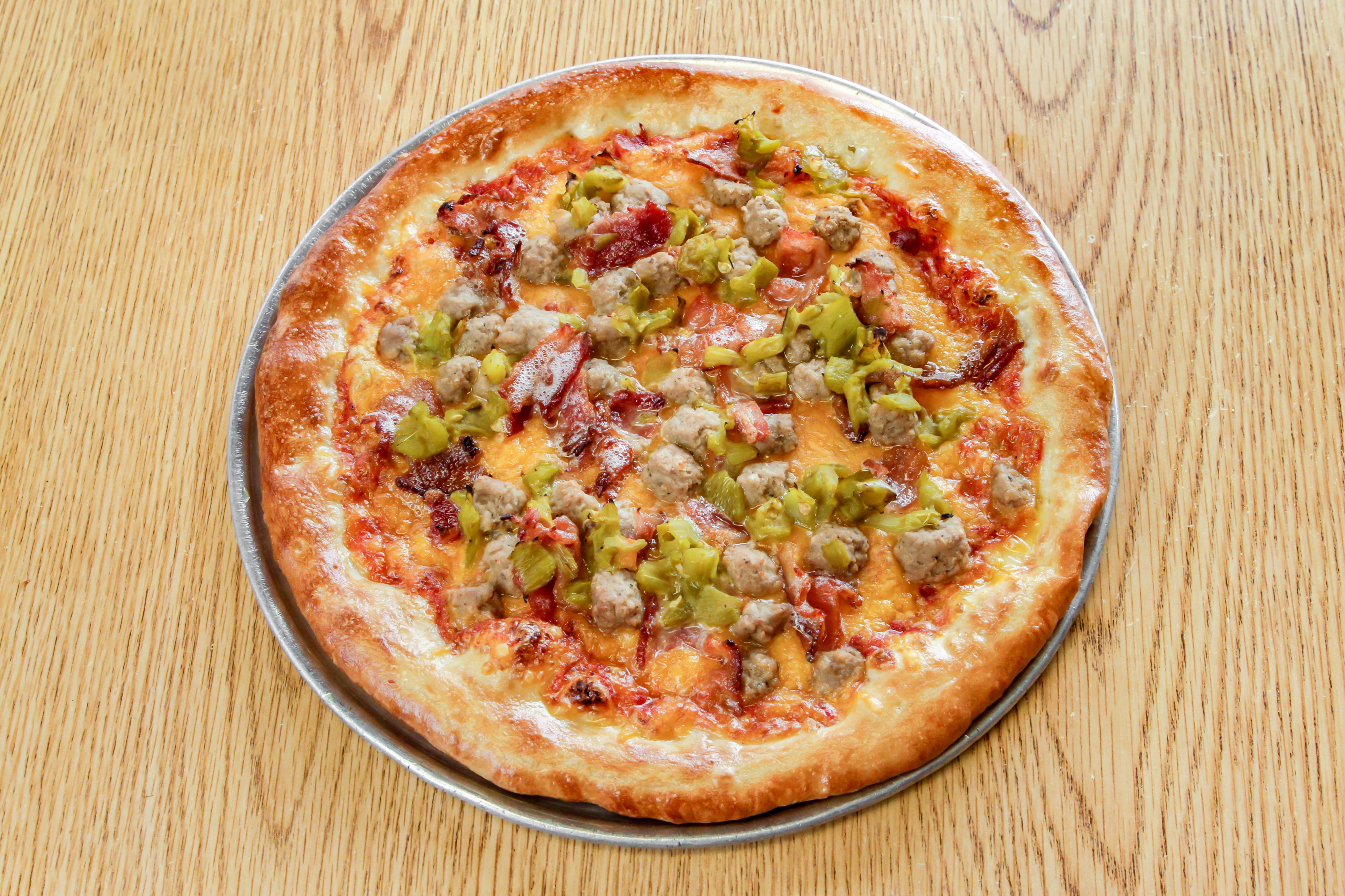 Order Cowboy Pizza - Small 10" food online from Marios Pizza store, Tucson on bringmethat.com