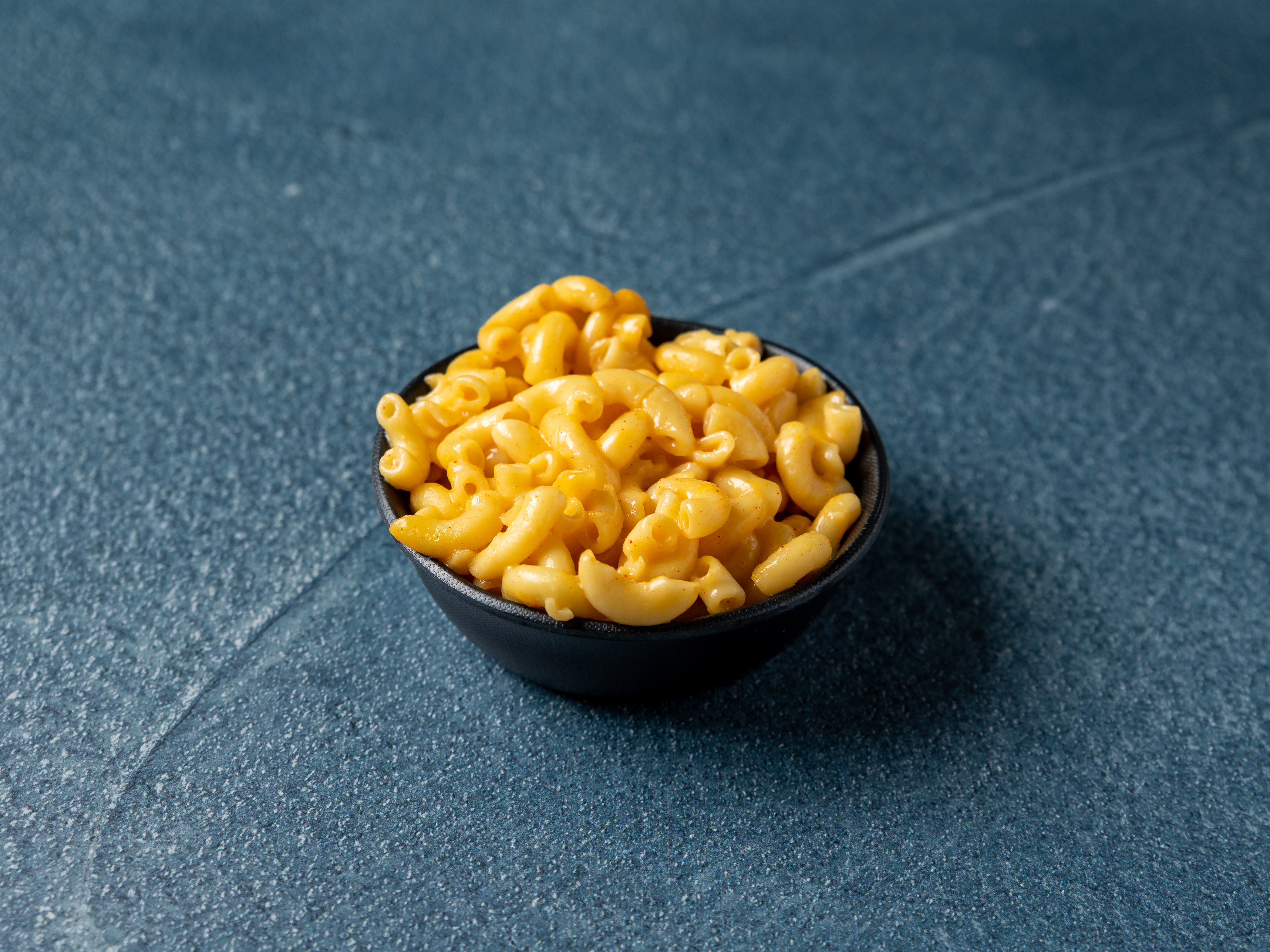 Order Mac and Cheese food online from Ragin' Hog Bbq store, Denver on bringmethat.com