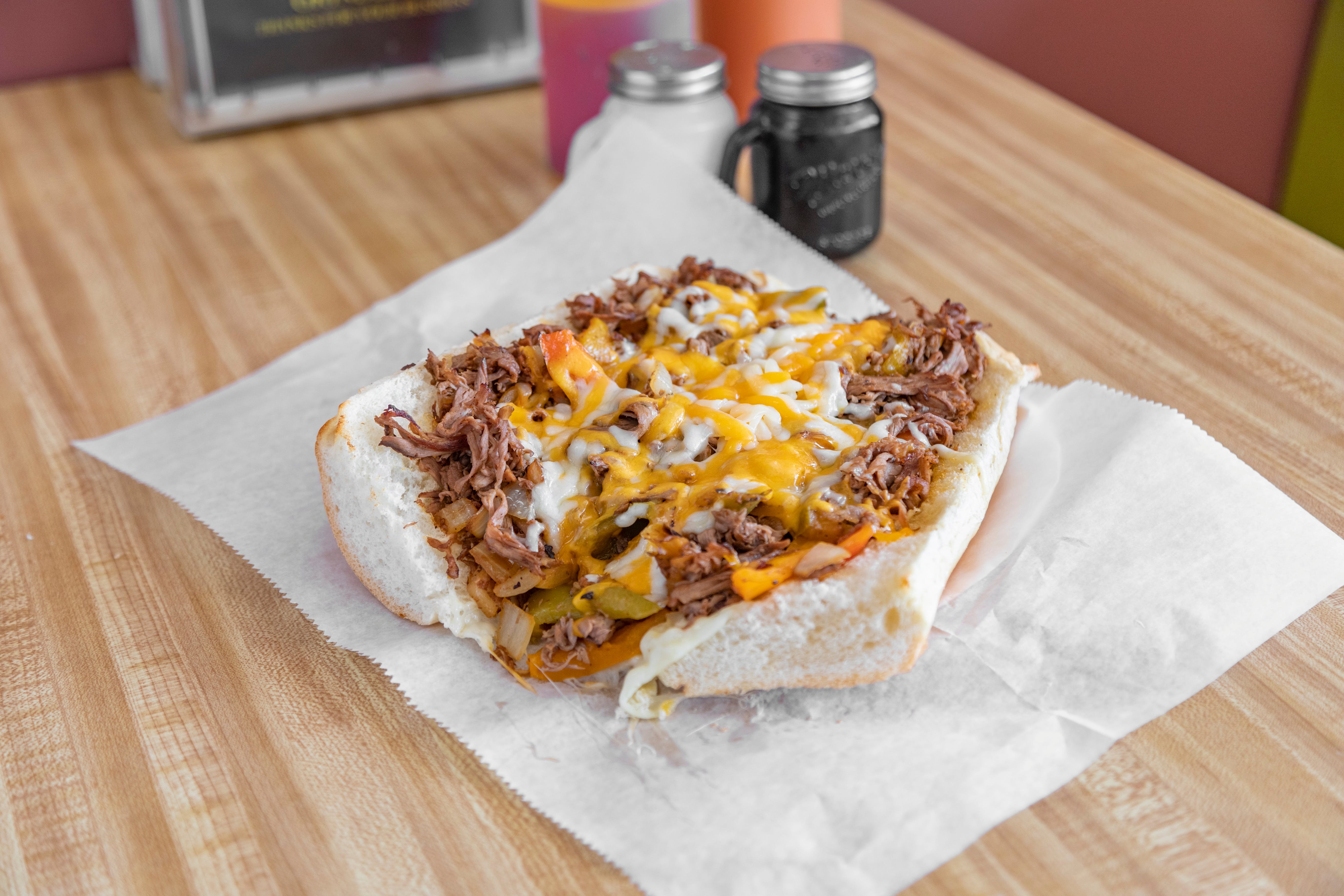 Order Philly Steak & Cheese Grinder - 8" food online from Second Poquonock Giant Grinder store, Windsor Locks on bringmethat.com