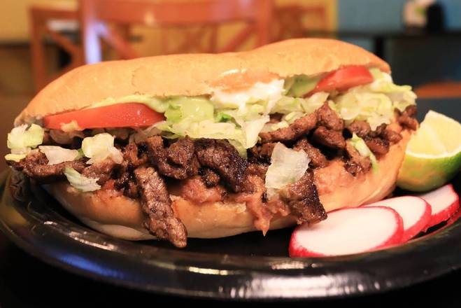 Order Torta food online from Guapos Taco store, Bakersfield on bringmethat.com