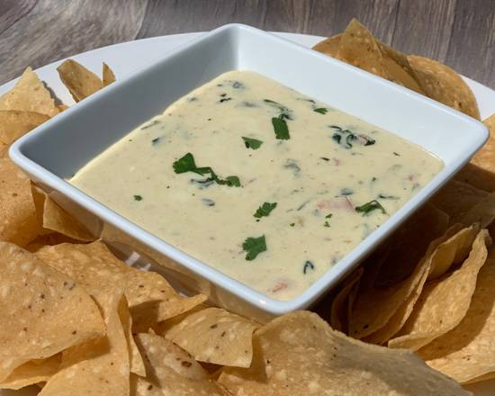 Order Queso Fundido Dip food online from Serrano Mexican Food store, Mesa on bringmethat.com