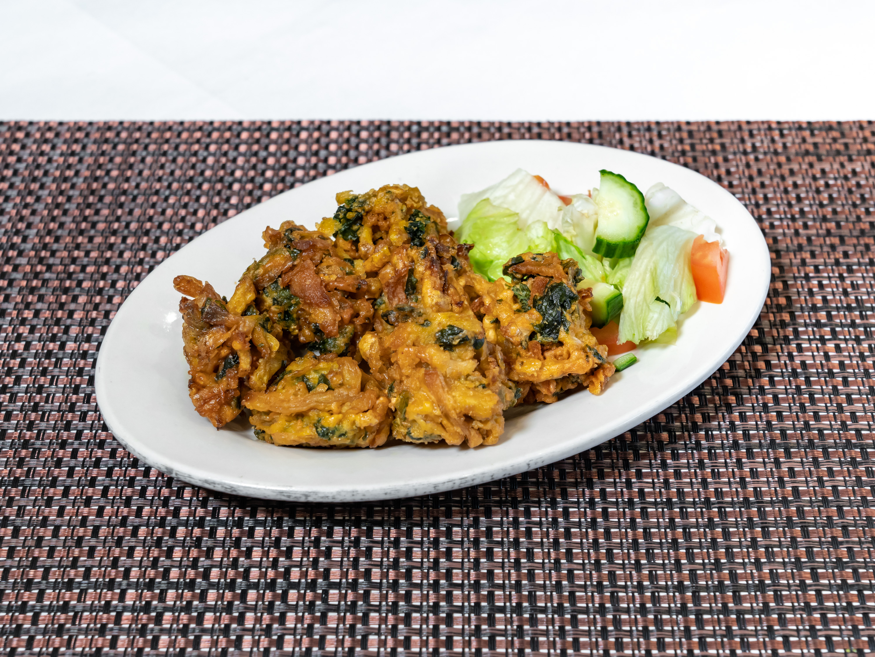 Order 11. Vegetable Pakora food online from New Little India store, Shelby Township on bringmethat.com