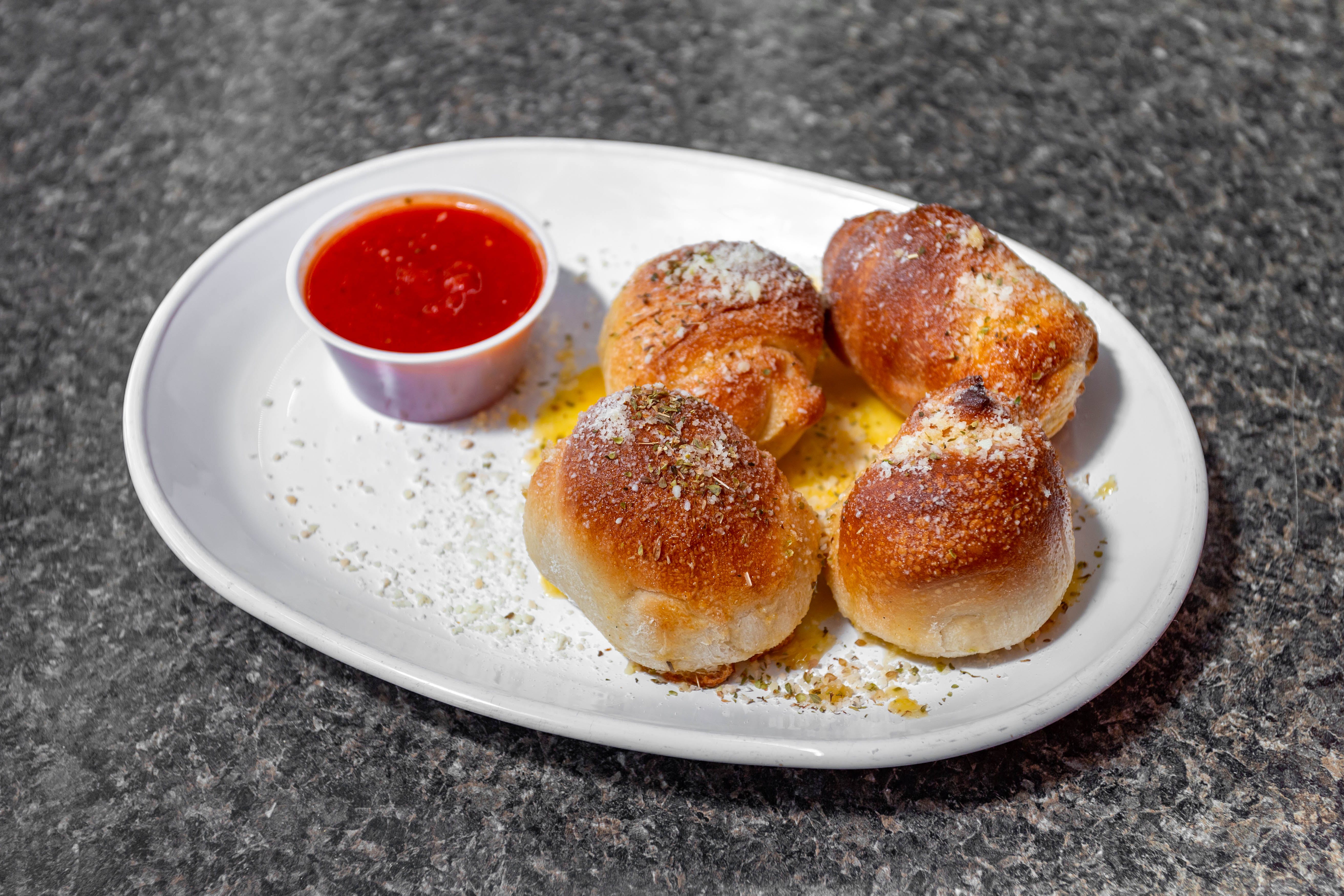 Order Garlic Knots - 4 Pieces food online from Verrazzanos New York Pizza store, Clearwater on bringmethat.com