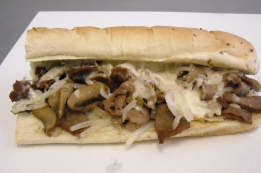 Order Steak & Cheese Sub - Half 8" food online from Valentino's Pizza store, Livonia on bringmethat.com