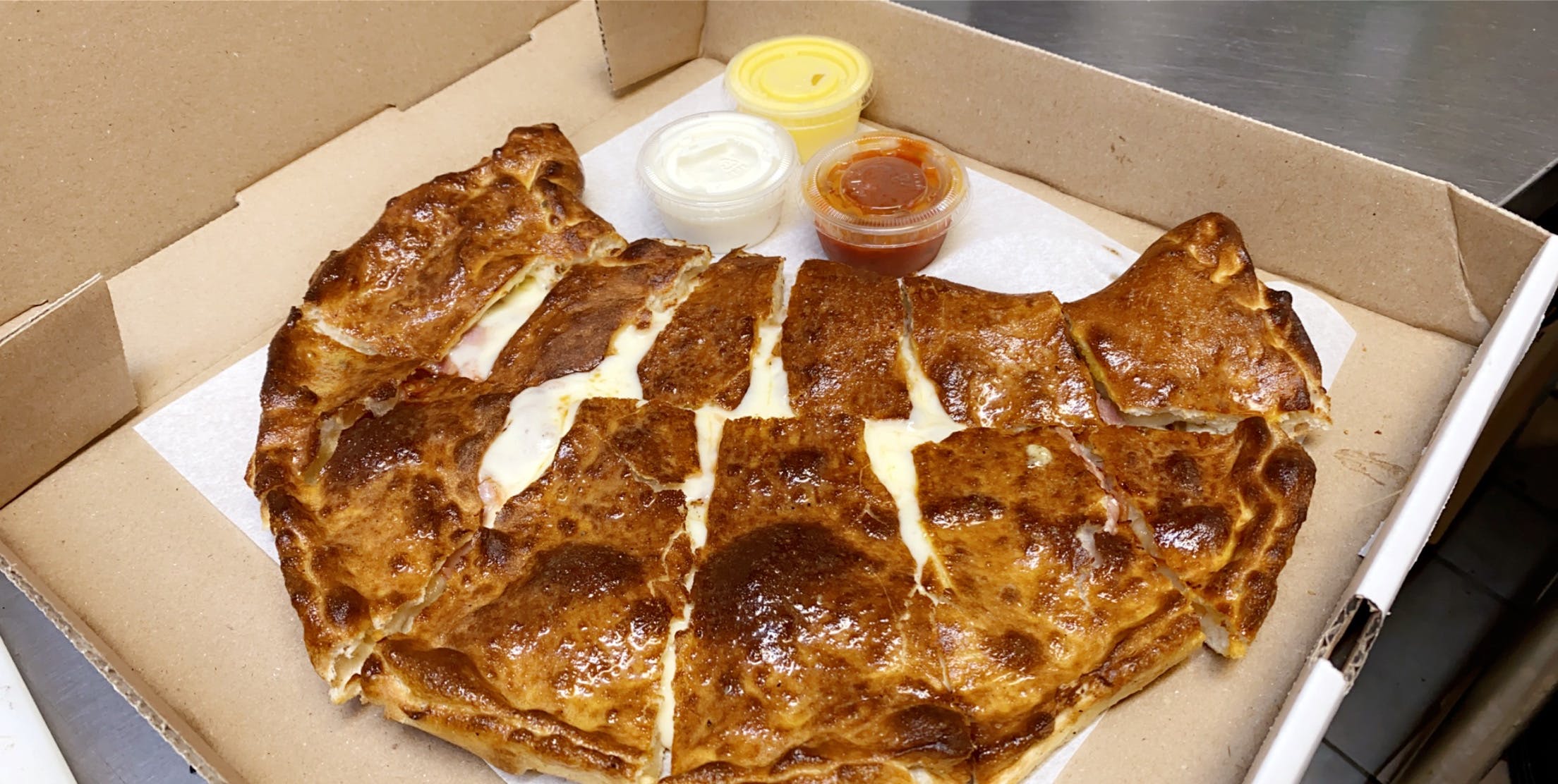Order Calzone with One Topping - Small food online from Milano's Pizza store, Overton on bringmethat.com