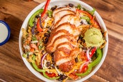 Order Southwest Salad food online from Spring Creek Barbeque store, Houston on bringmethat.com