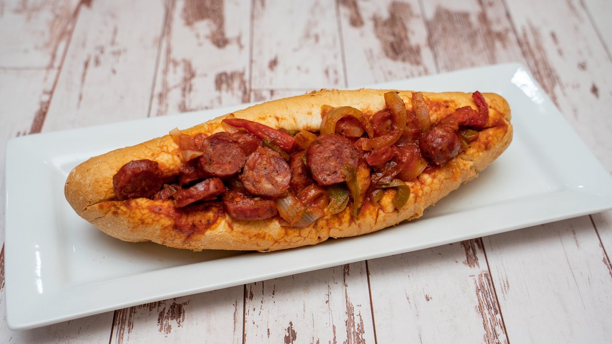 Order 12. Italian Sausage Sub food online from Cheesesteak grille store, Roseville on bringmethat.com