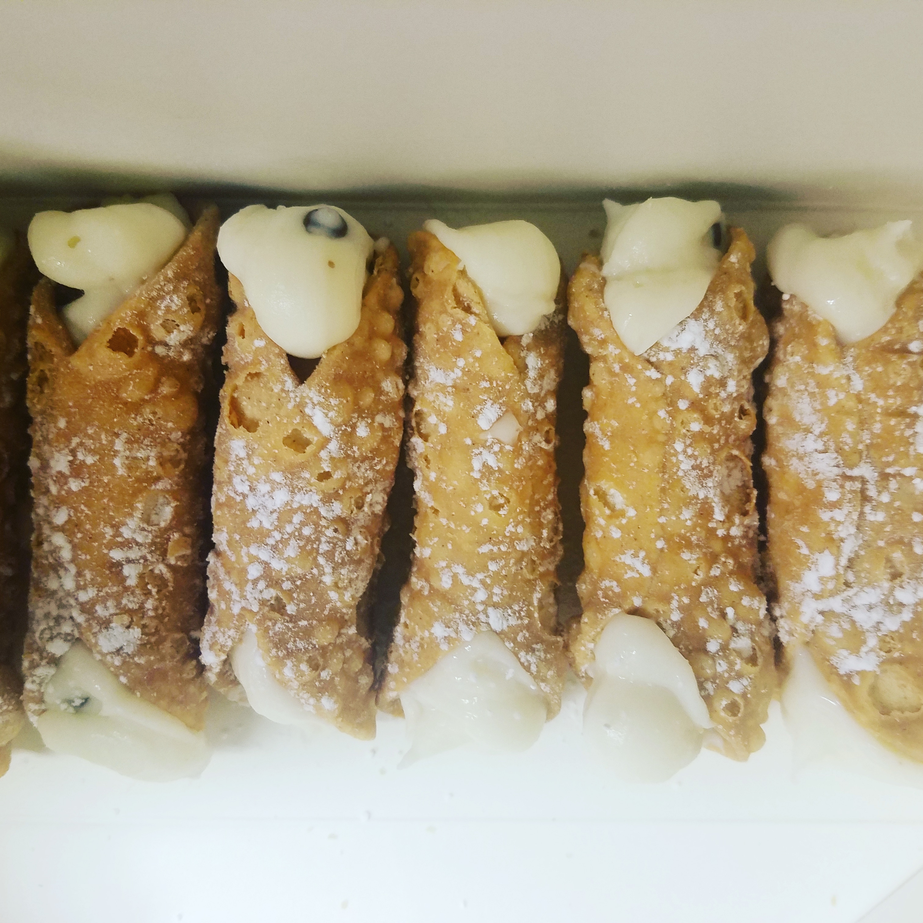 Order Mini Cannolis food online from Coffeecol Arepa Bar & Grill store, Teaneck on bringmethat.com