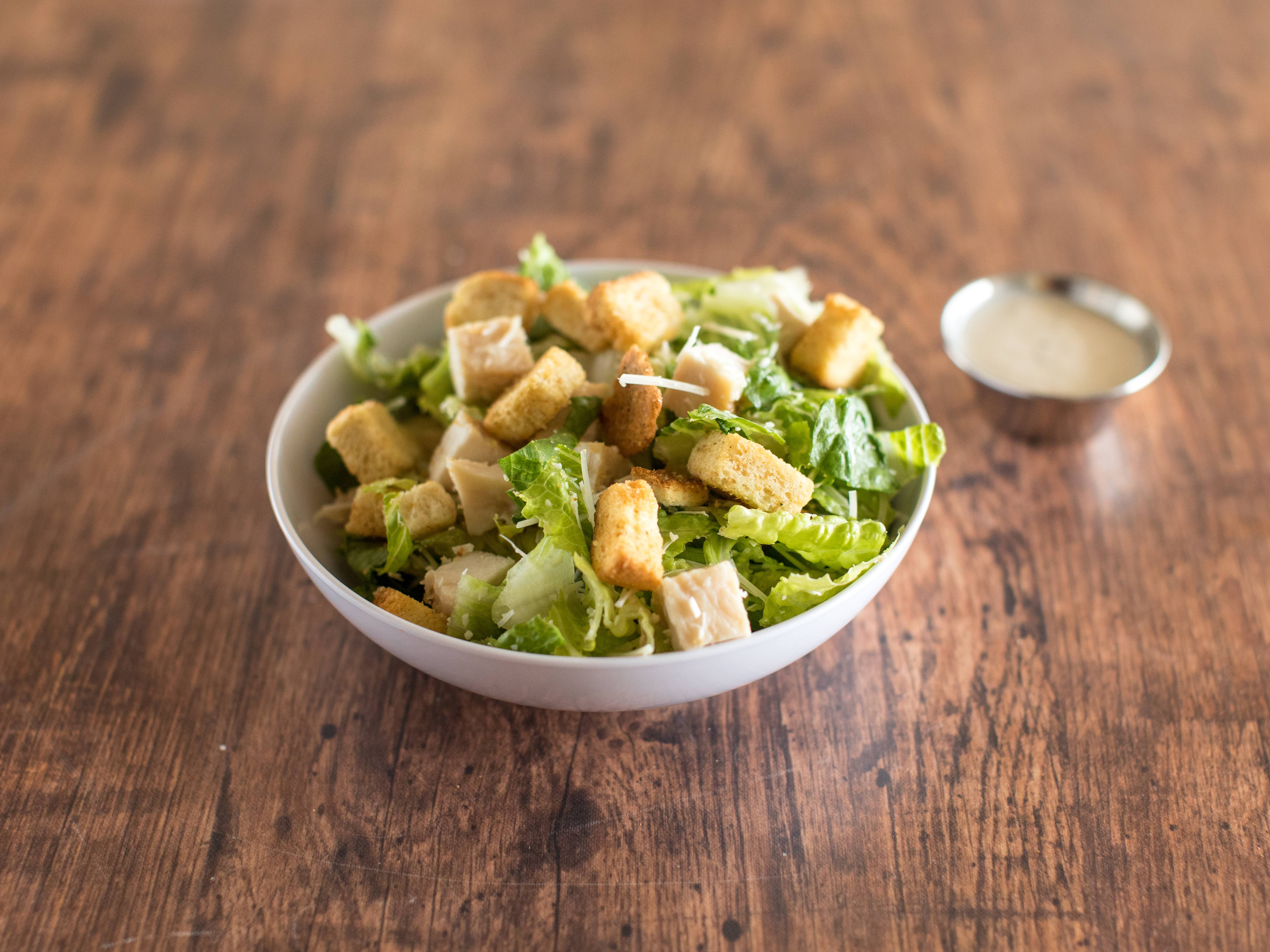 Order 43. Chicken Caesar Salad food online from Padow's Hams & Deli store, Glen Allen on bringmethat.com