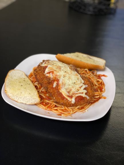 Order Chicken Parmesan Dinner food online from Falcone Pizzeria store, Oklahoma City on bringmethat.com