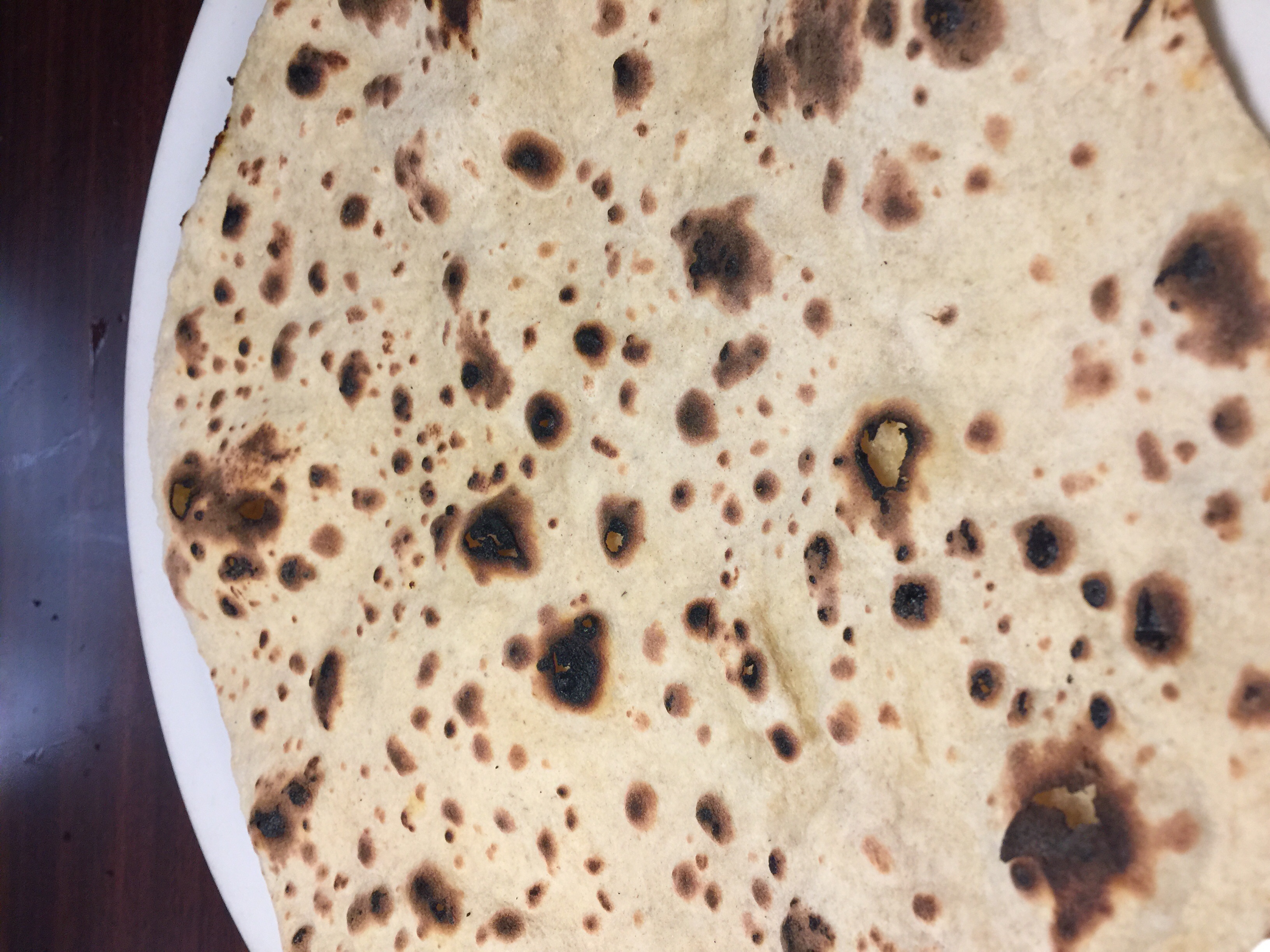 Order Chapati food online from India Quality Restaurant store, Boston on bringmethat.com