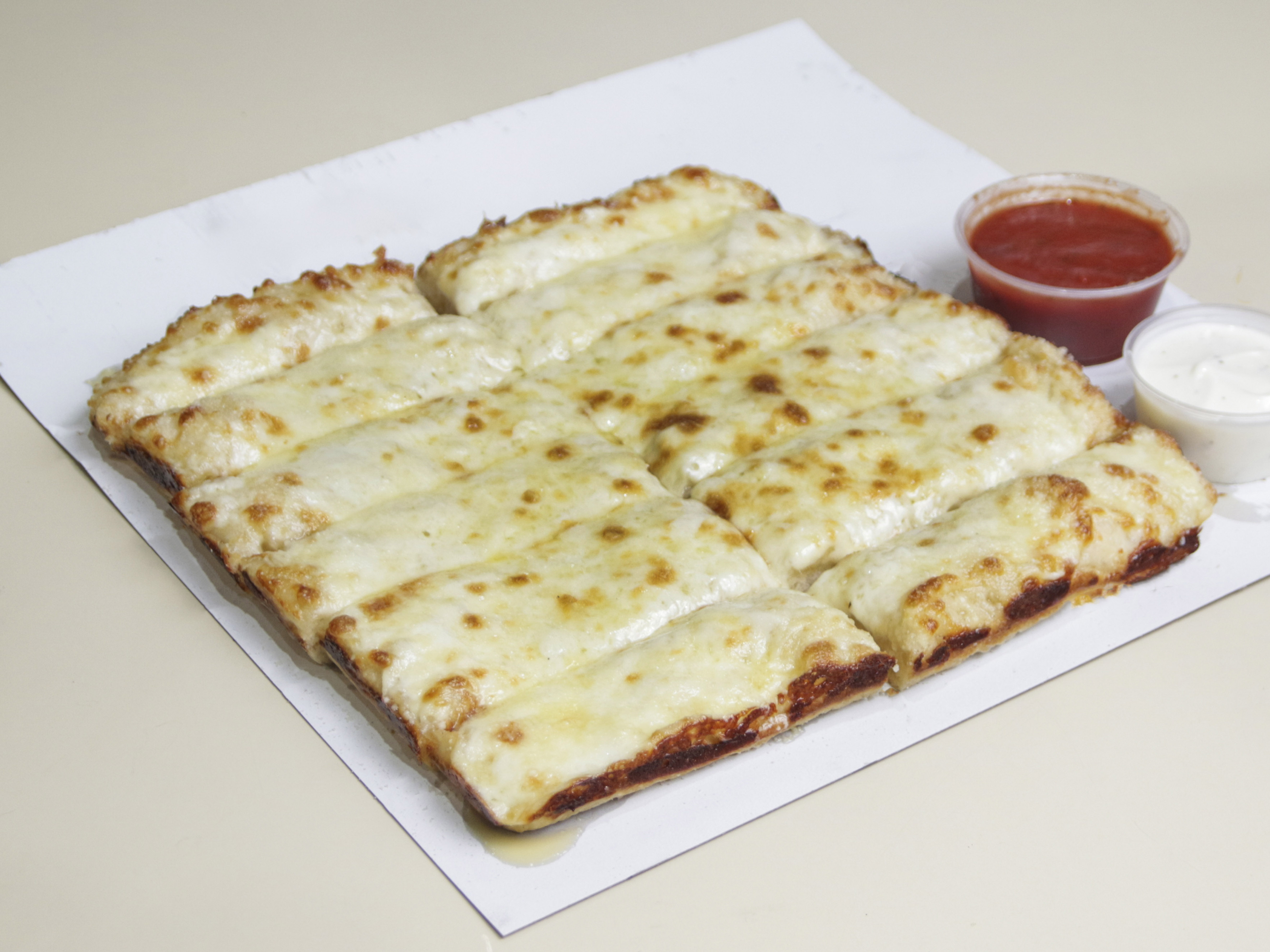 Order Dozen Cheese Bread Sticks food online from Pizza Kitchen store, Dearborn on bringmethat.com