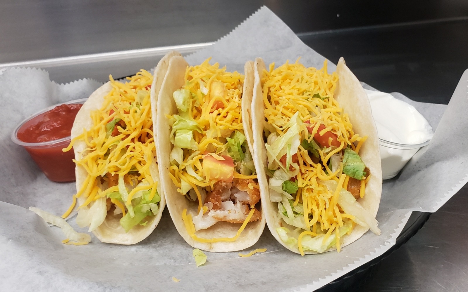 Order 3 Fish Tacos food online from 1st Place Sports Bar store, Hoffman Estates on bringmethat.com