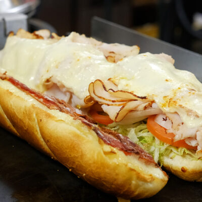 Order Turkey Club Hot Sub food online from Francos Pizza & More store, Kenmore on bringmethat.com