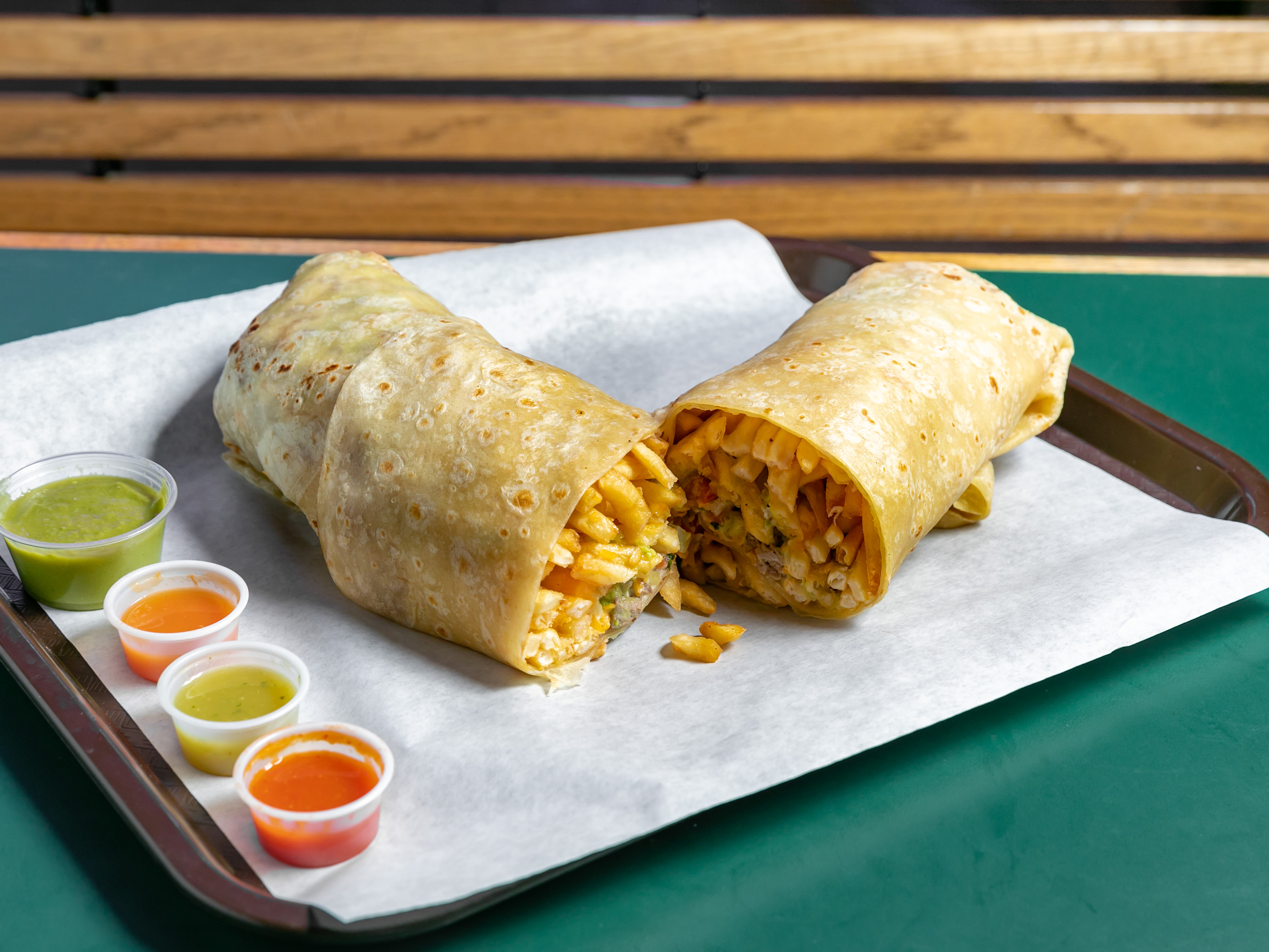 Order Champion Burrito food online from Daniels Taco Shop store, El Cajon on bringmethat.com