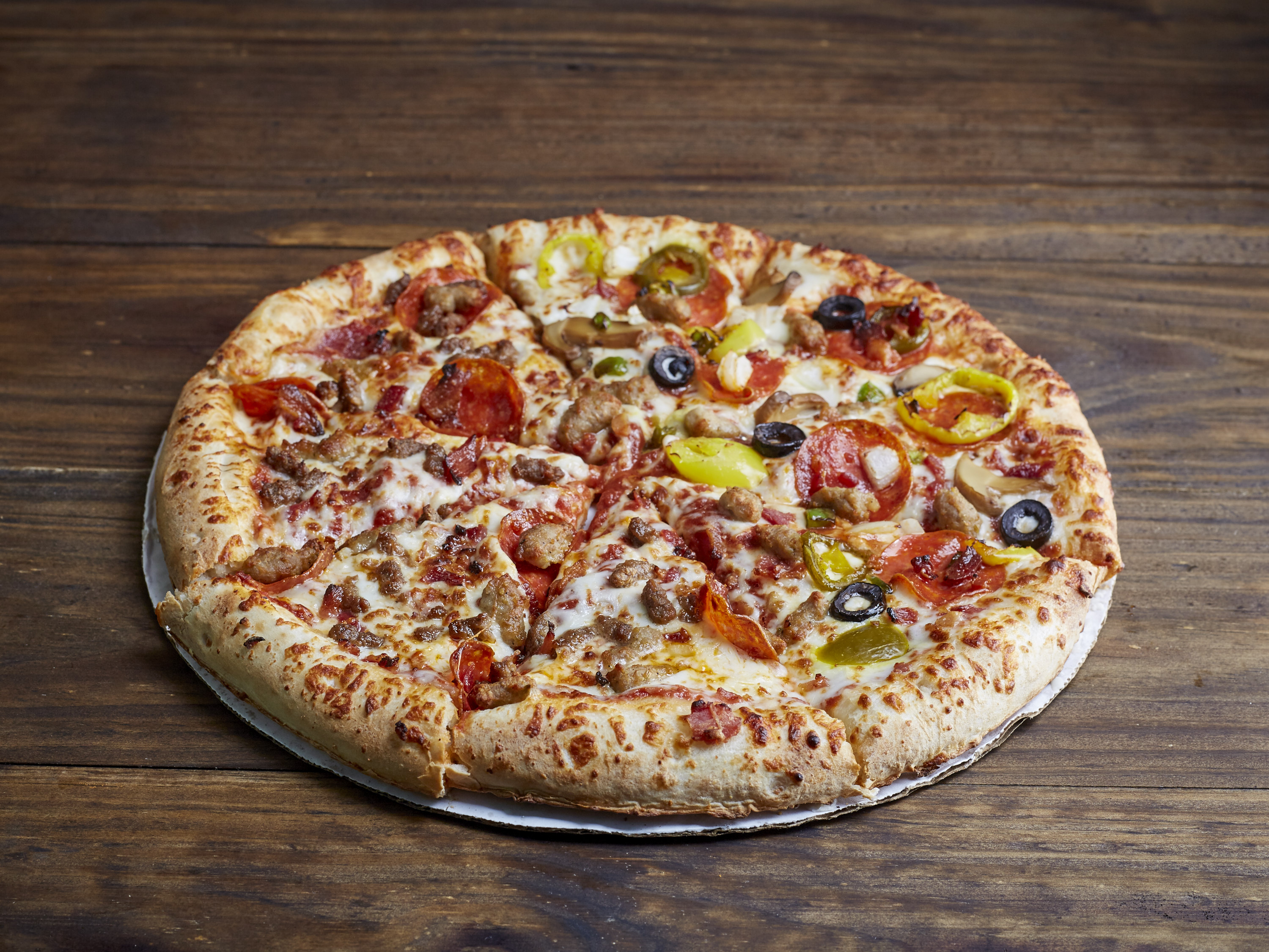 Order Large 12" Pizza food online from Hunt Brothers Pizza store, Atlanta on bringmethat.com