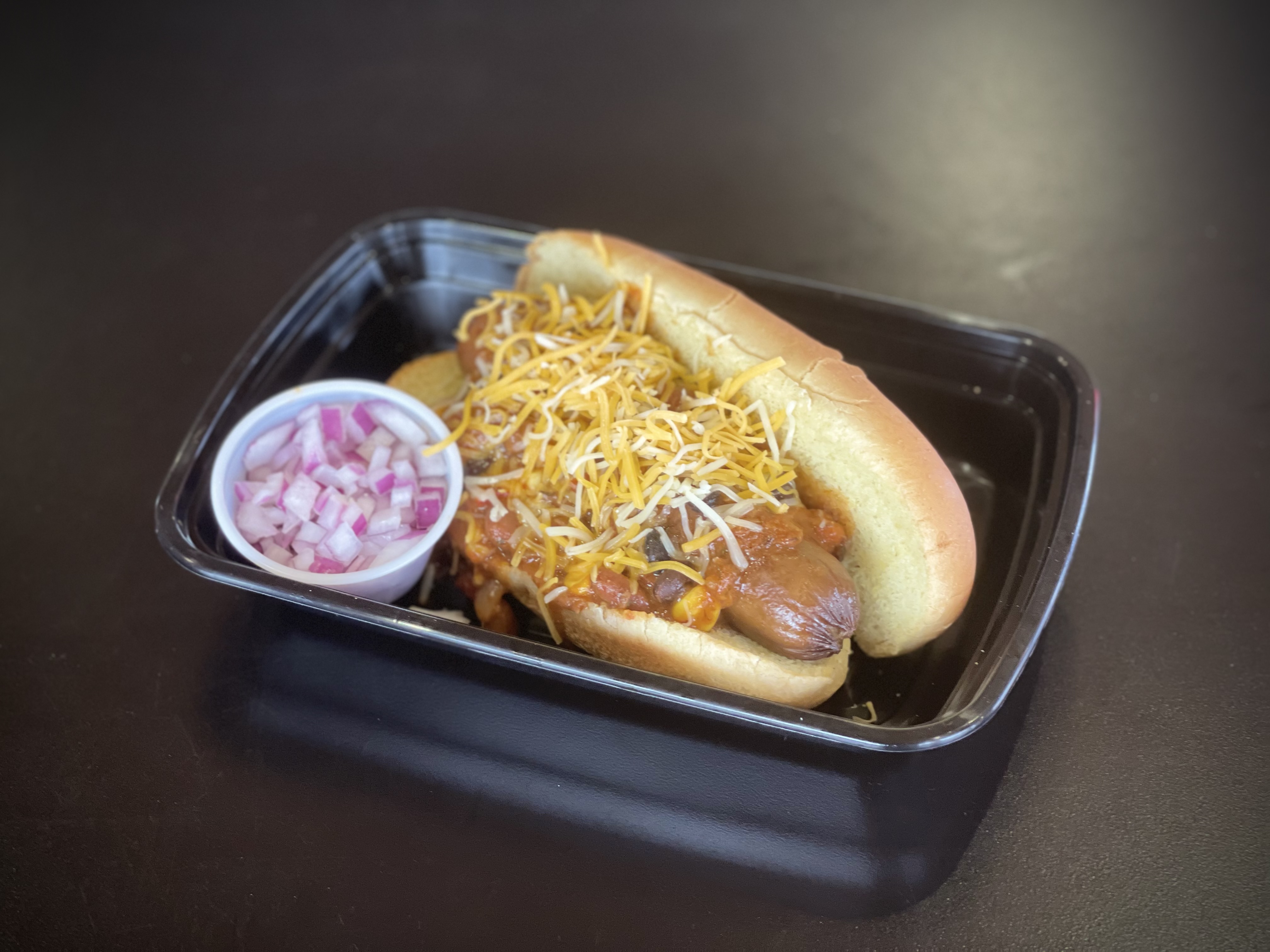 Order Chili Cheese Hot Dog food online from Hog Wild BBQ store, Holland on bringmethat.com