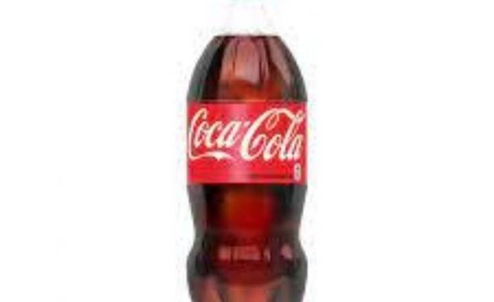 Order Coca Cola (2L) food online from Alpaca Peruvian Charcoal Chicken store, Raleigh on bringmethat.com