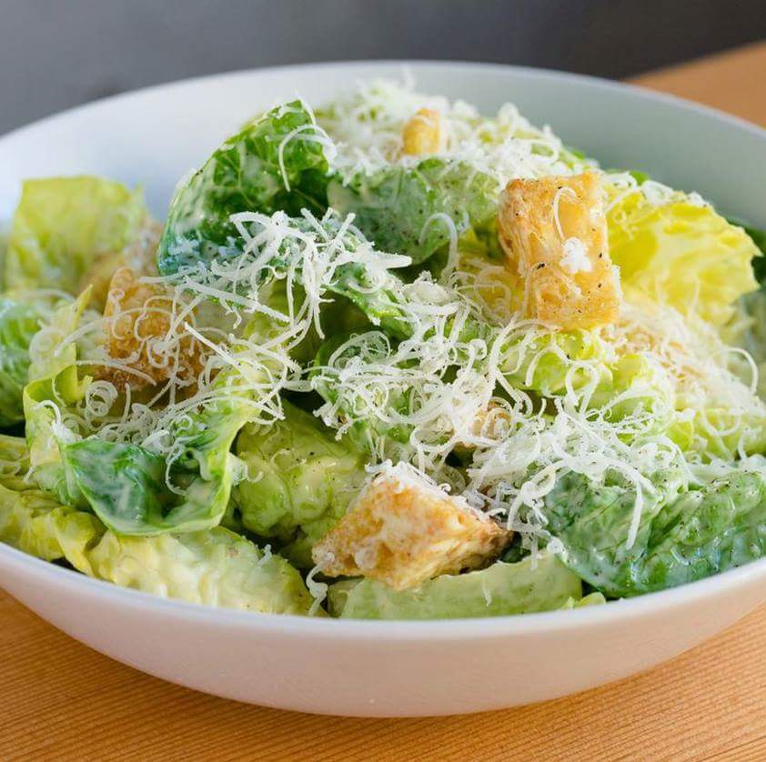 Order Caesar Salad food online from Ciros Pizza Cafe store, Citrus Heights on bringmethat.com