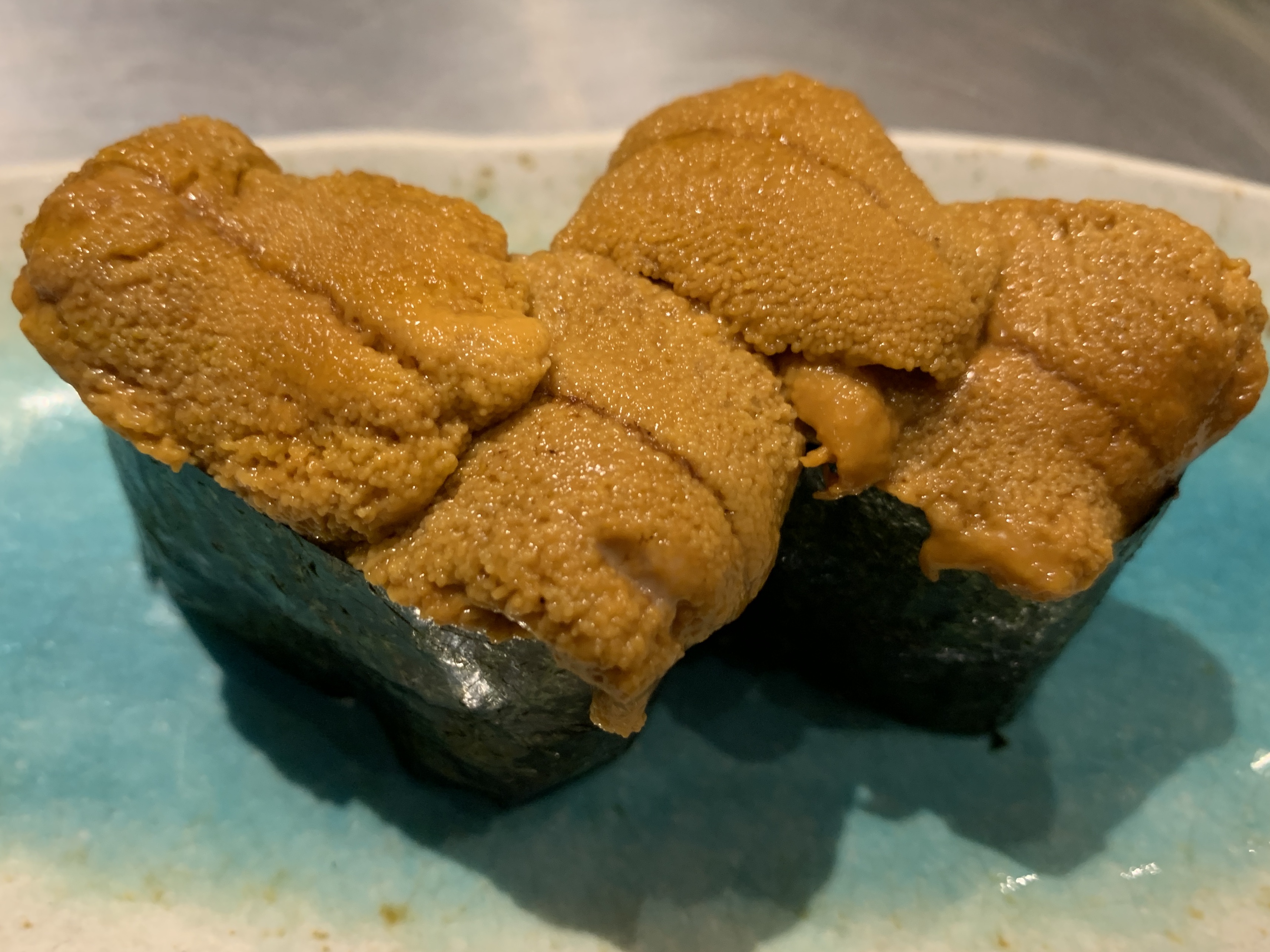 Order Uni Nigiri food online from Blue Fin Sushi store, San Francisco on bringmethat.com