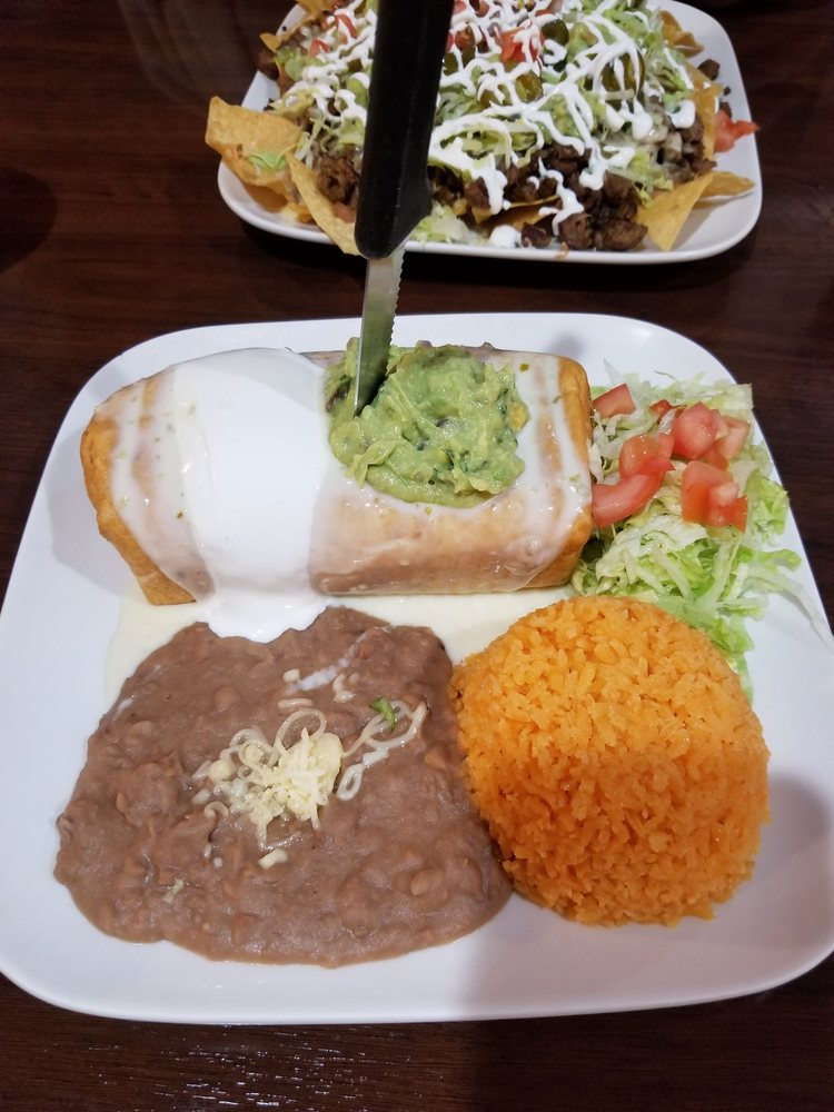 Order Chimichanga Lunch food online from El Poblano store, Merrillville on bringmethat.com