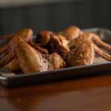 Order Smoked Monster Wings food online from Barrel & Bones store, The Colony on bringmethat.com