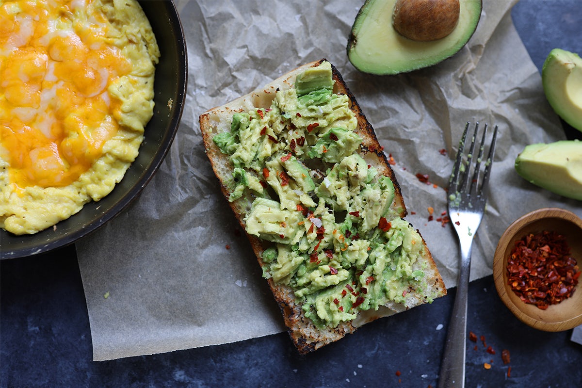 Order Cheesy Eggs + Avocado Toast food online from Lazy Dog store, Cupertino on bringmethat.com
