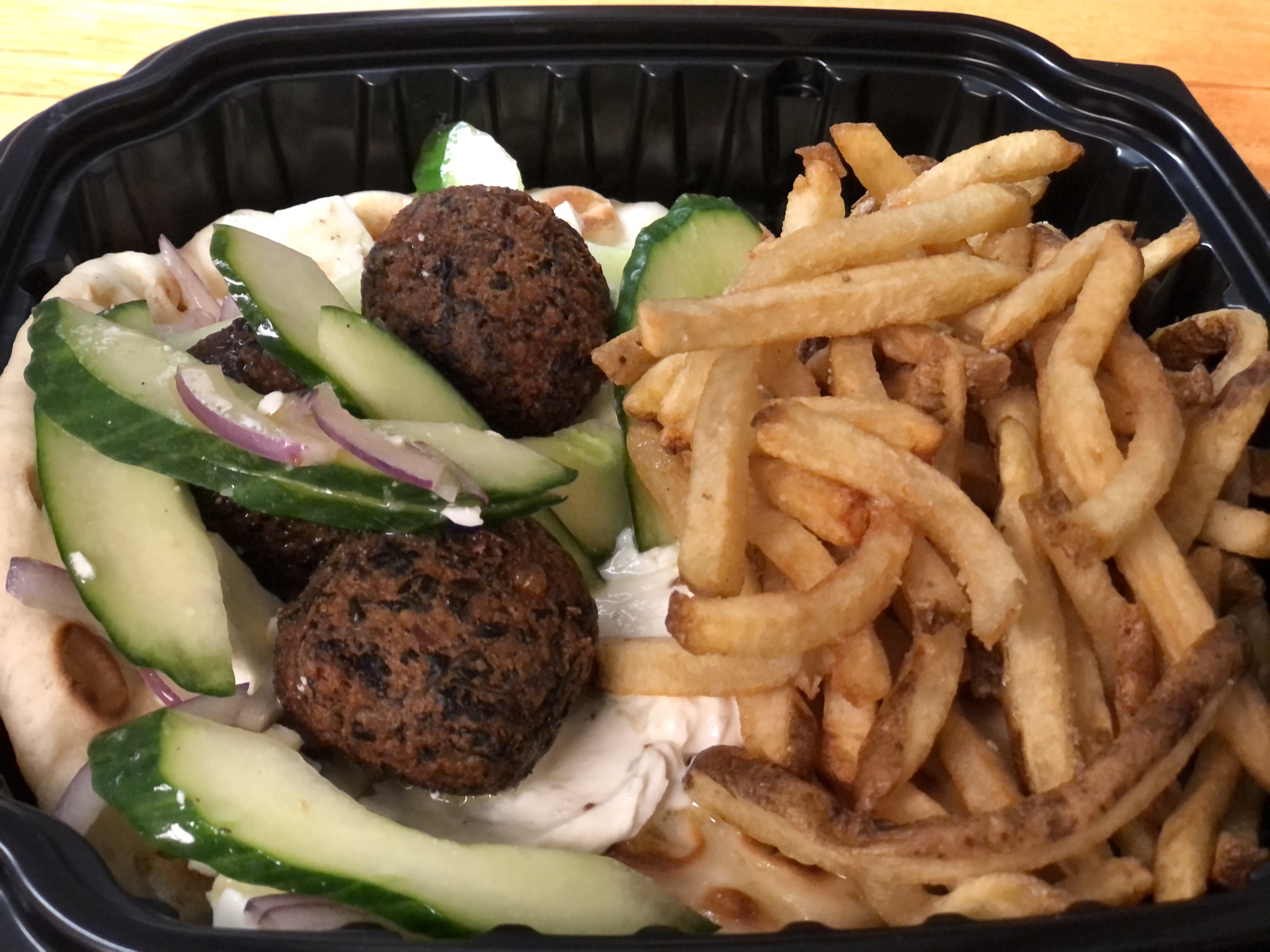 Order Spinach Falafel Sandwich food online from Commonwealth store, Chicago on bringmethat.com