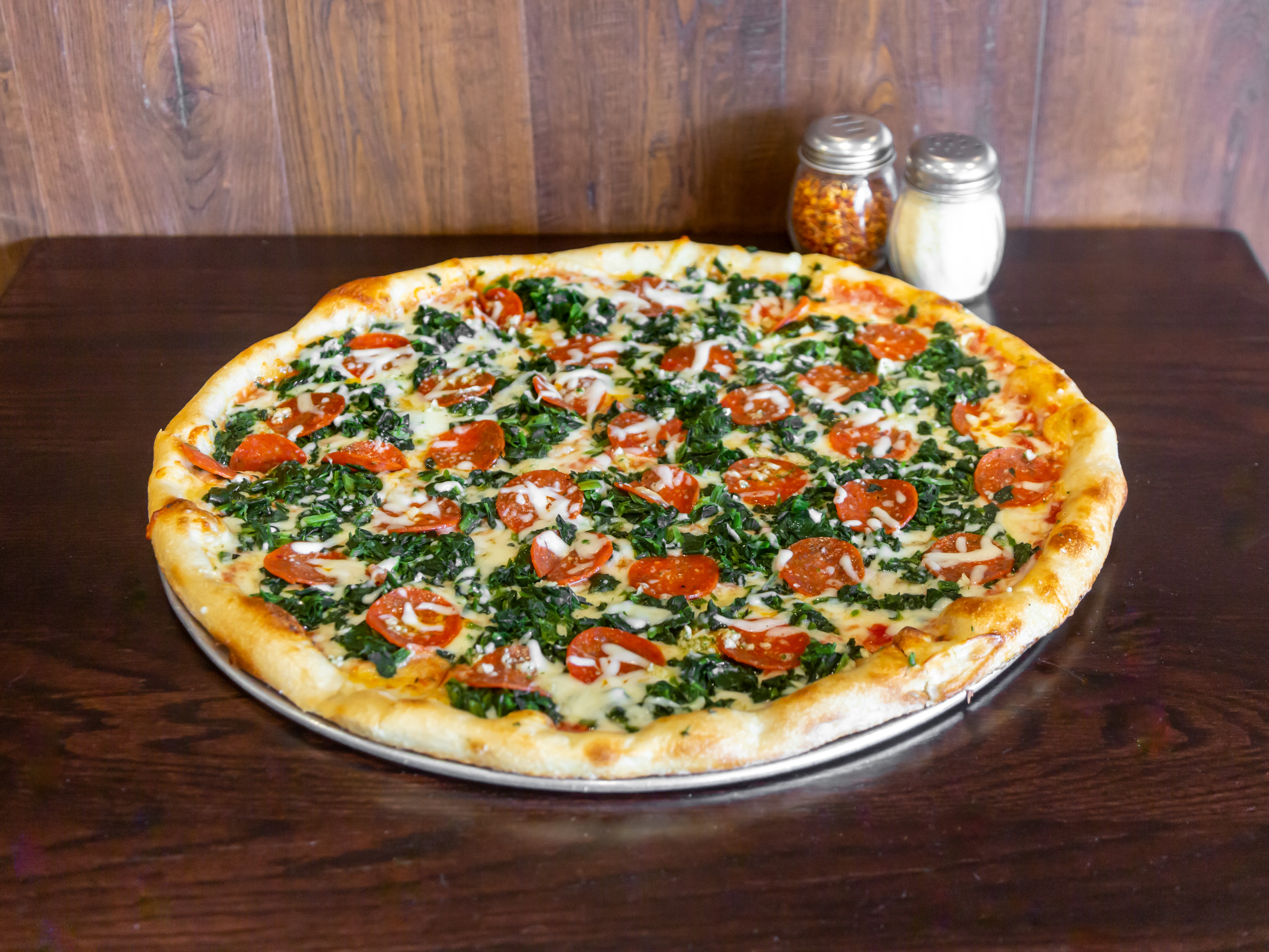 Order Large White Spinach Pizza food online from Illiano Pizzeria & Restaurant store, Colchester on bringmethat.com