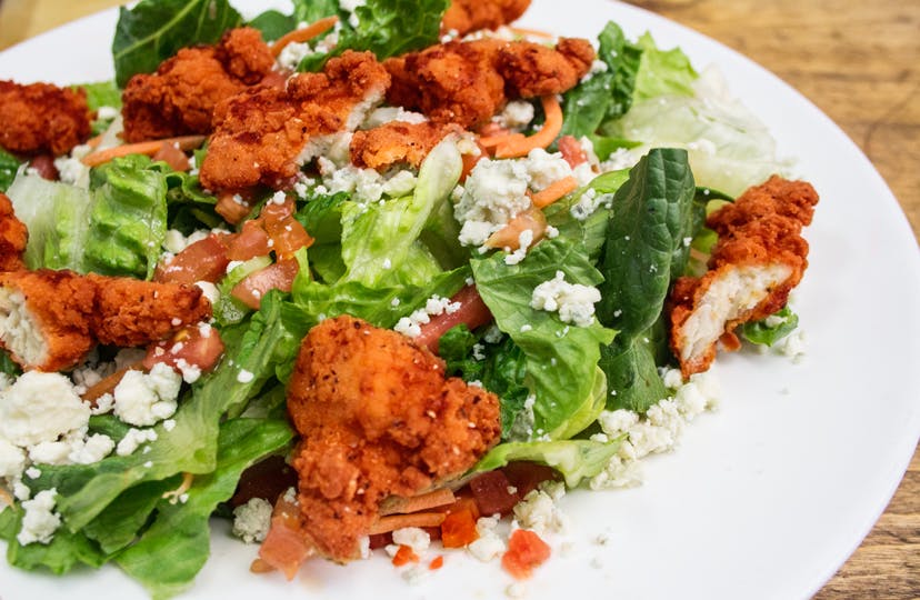 Order Crispy Buffalo Salad - Large food online from NYPD Pizza store, Orlando on bringmethat.com