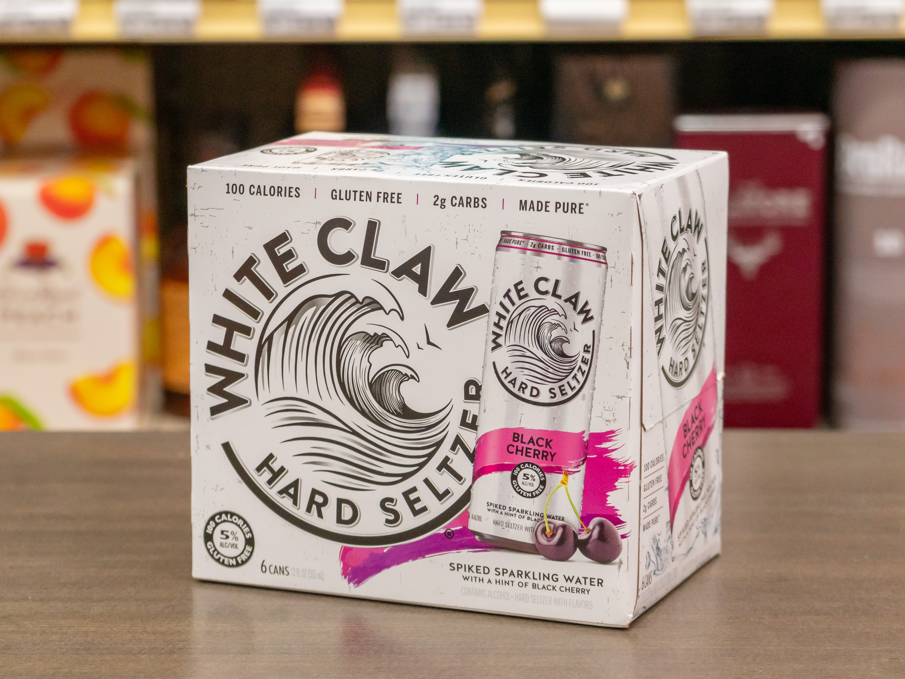 Order 6 Pack - 12 oz. Can of White Claw Black Cherry Hard Seltzer (5.0% ABV) food online from Burlingame Liquor store, Burlingame on bringmethat.com