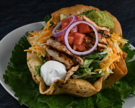 Order Taco Salad Chicken food online from Rainforest Cafe store, Nashville on bringmethat.com