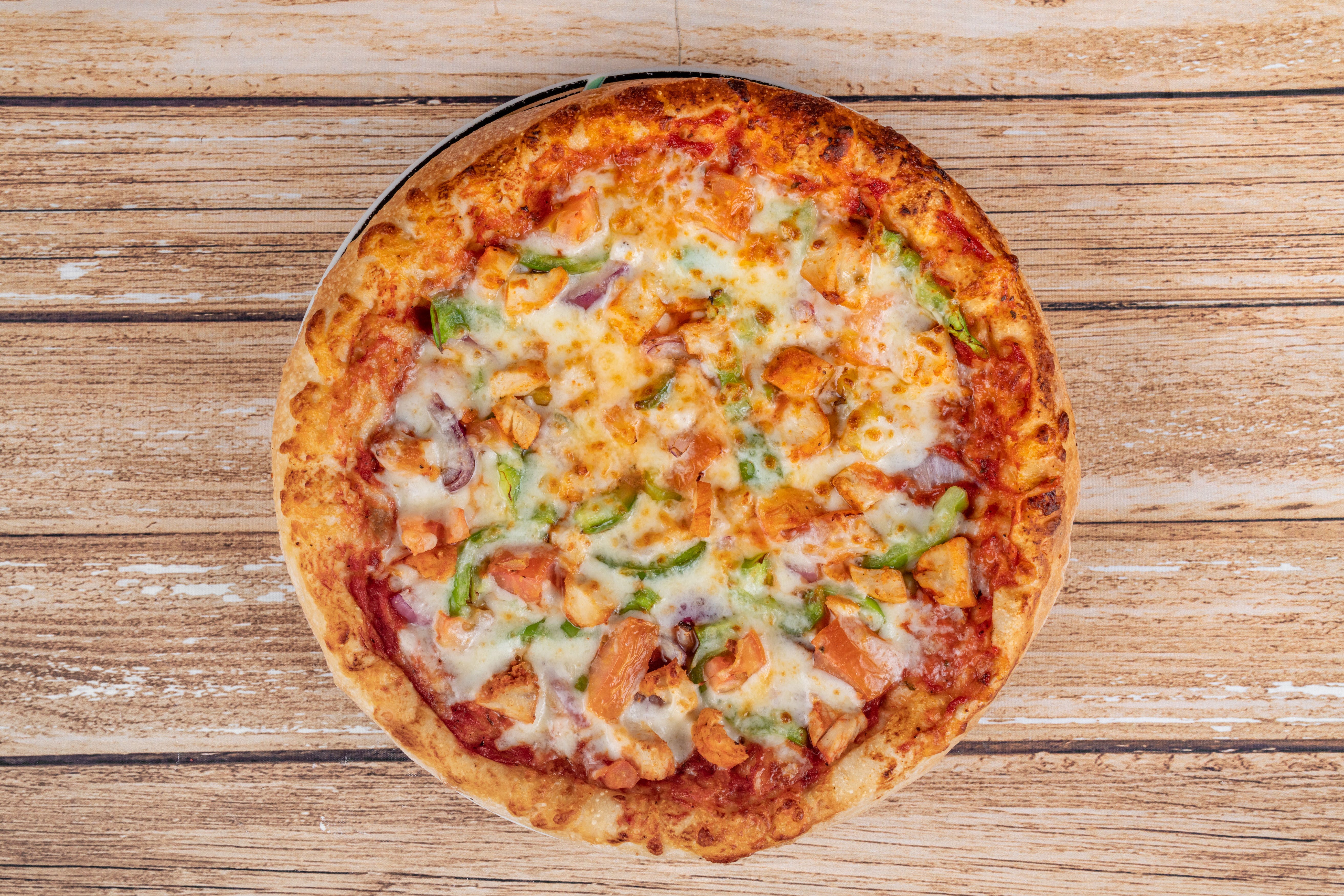 Order Chicken Fajita Pizza - Small 10'' (6 Slices) food online from Angelo's Pizza store, Houston on bringmethat.com