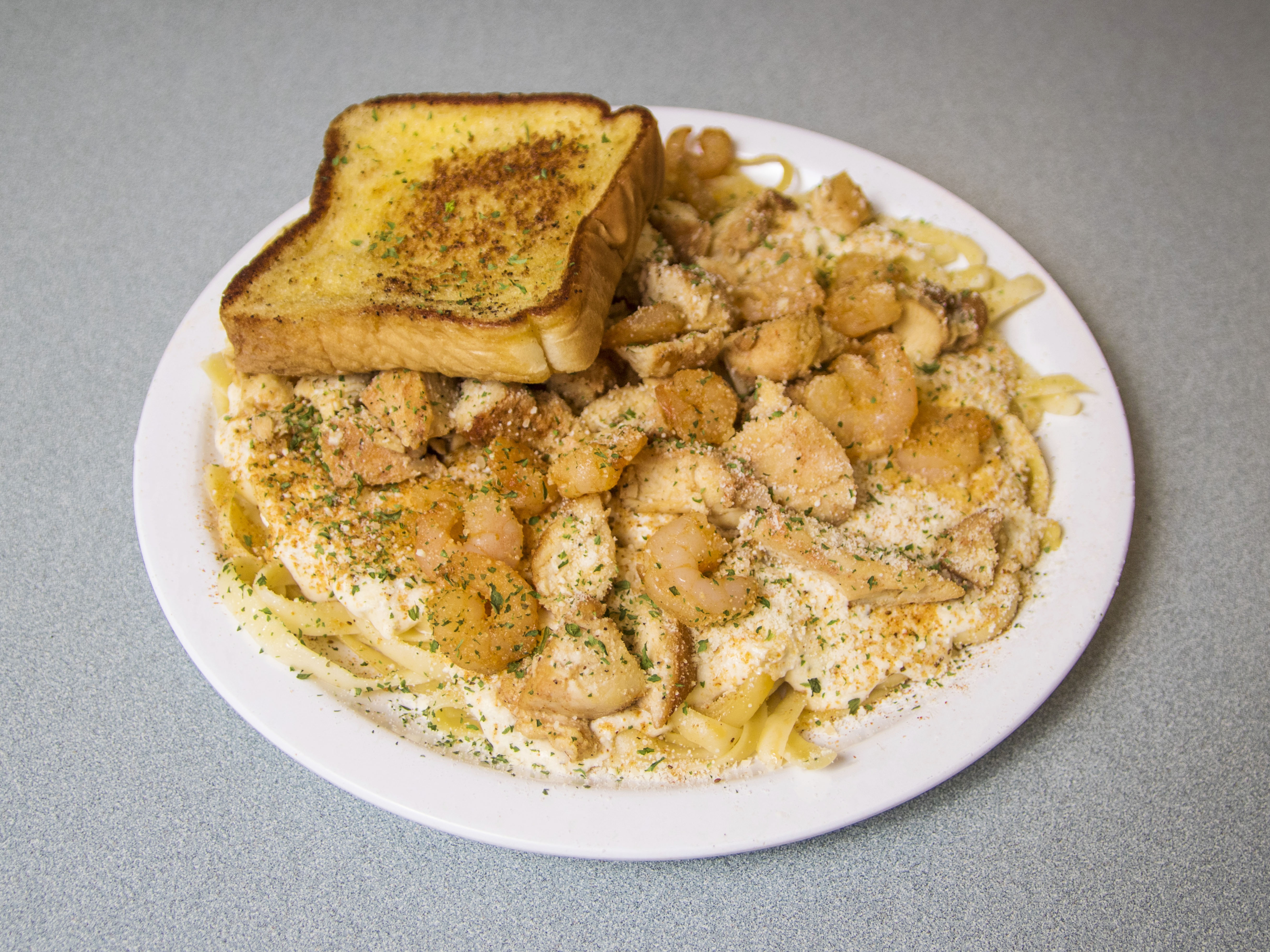 Order Chicken and Shrimp Alfredo food online from The Crab House store, Detroit on bringmethat.com