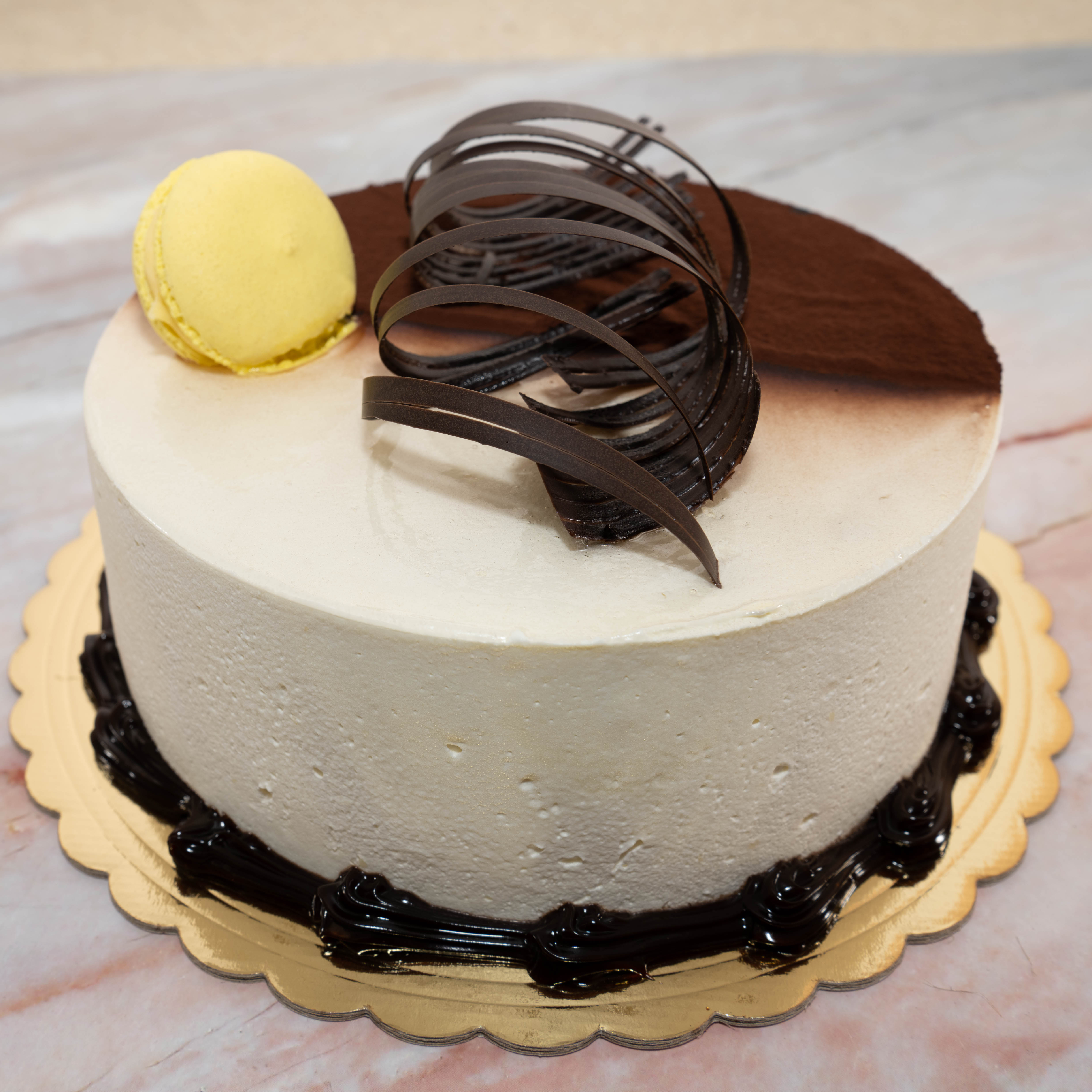 Order TIRAMISU CAKE food online from Teapot Bakery And Cafe store, Glendale on bringmethat.com