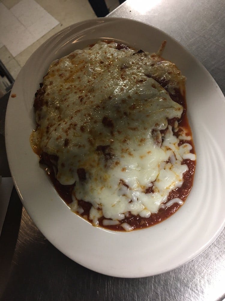 Order Veal Parmigiana Dinner - Entree food online from Rosa Italian Pizza & Restaurant store, Powhatan on bringmethat.com