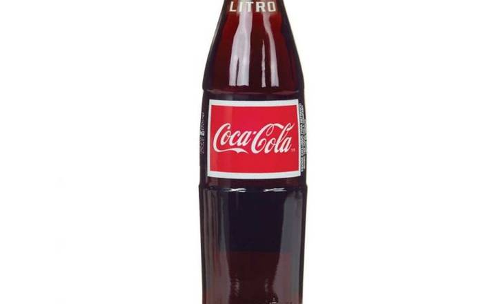 Order Coca Cola (12OZ) food online from Alpaca Peruvian Charcoal Chicken store, Knightdale on bringmethat.com