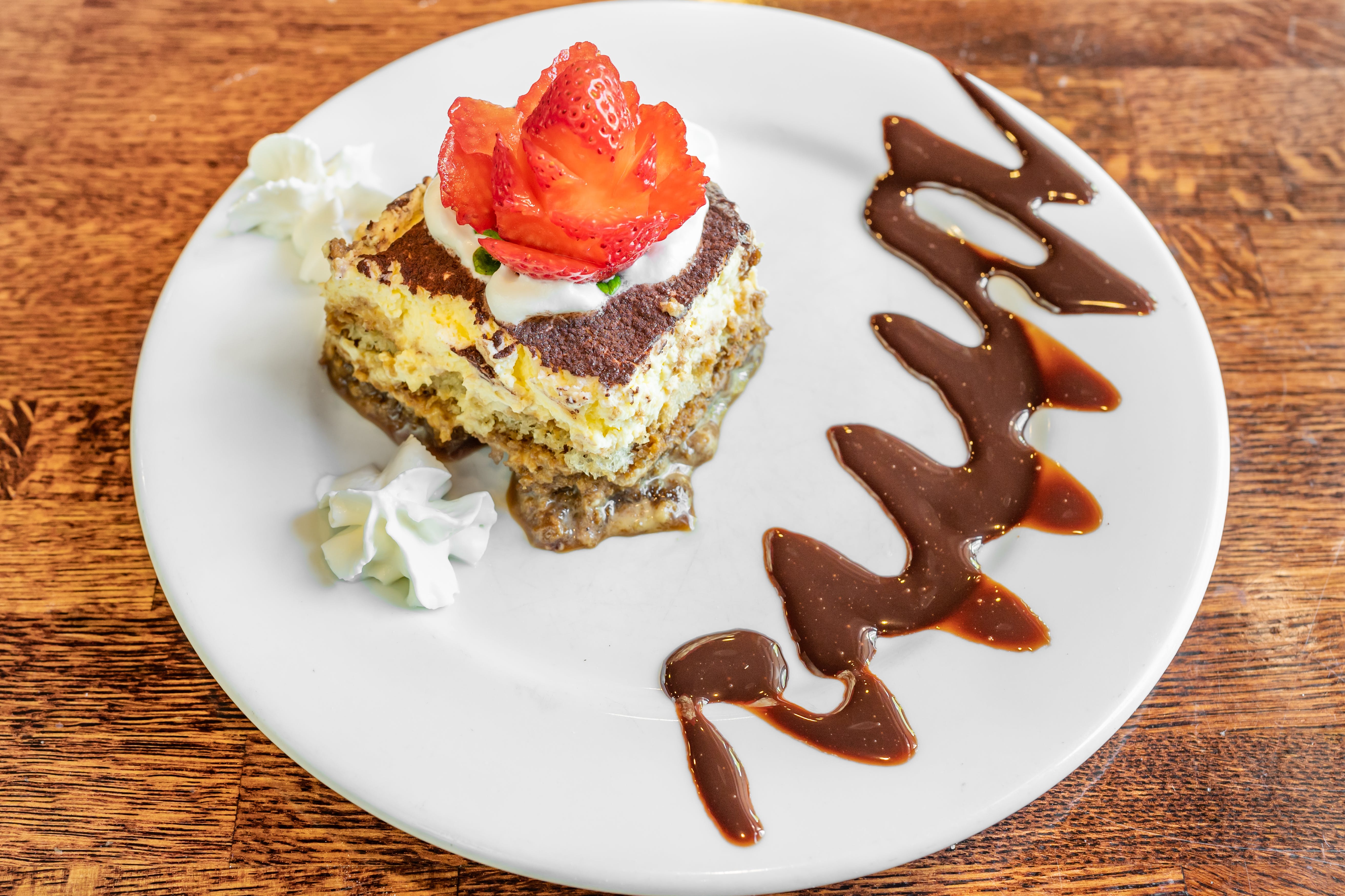 Order Tiramisu - Dessert food online from Dolce Vita Italian Restaurant store, Midlothian on bringmethat.com