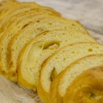 Order White Chocolate Bread Sliced (2 lbs.) food online from Croissant Bakery store, Norcross on bringmethat.com