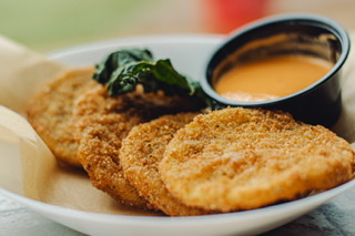 Order Fried Green Tomatoes food online from Trend Urban Cafe store, Stone Mountain on bringmethat.com