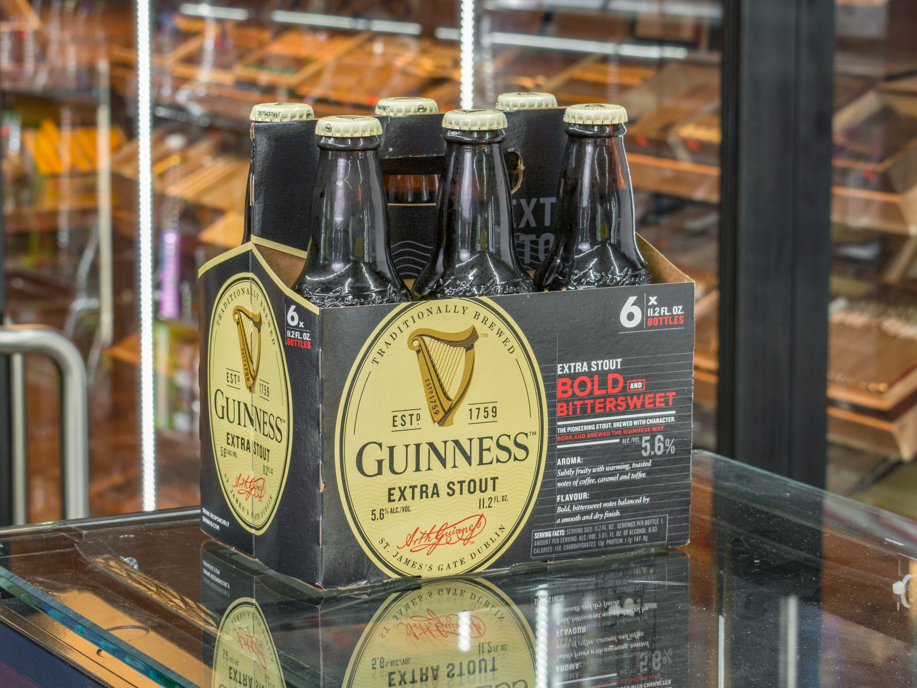 Order 6 pack bottle of GUINNESH STOUT food online from ELITE CIGARS AND CONVENIENCE INC store, Lindenhurst on bringmethat.com