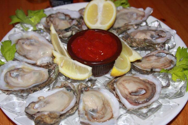 Order Grilled Oysters on the Half Shell food online from Crown Point Crab House store, Charlotte on bringmethat.com