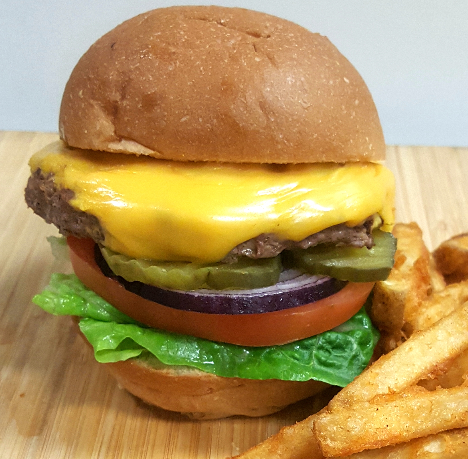 Order Cheeseburger and Fries food online from Springdale Cafe store, Huntington Beach on bringmethat.com
