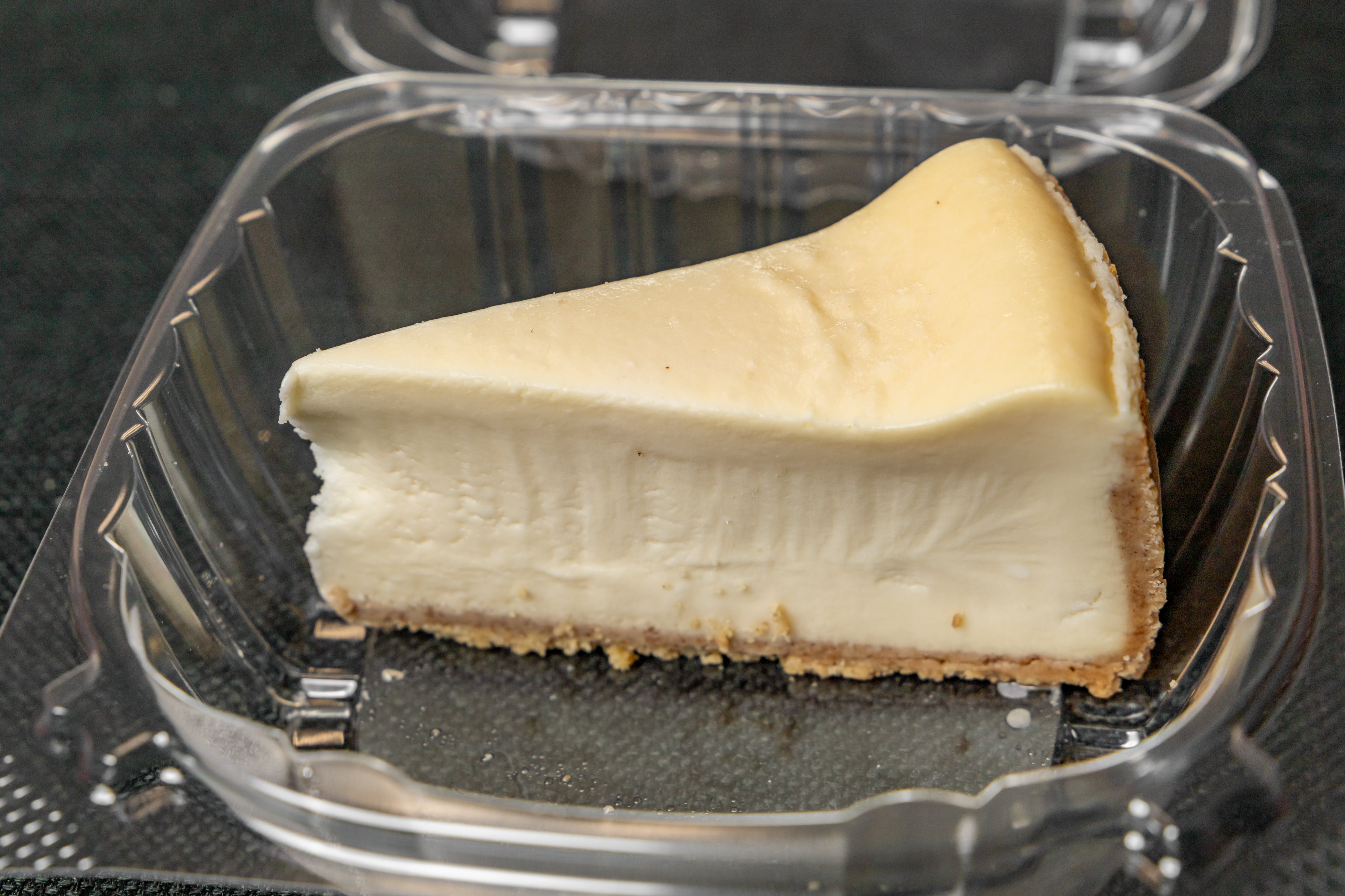 Order New York Style Cheesecake - Dessert food online from Mingaliens Trattoria store, Natick on bringmethat.com