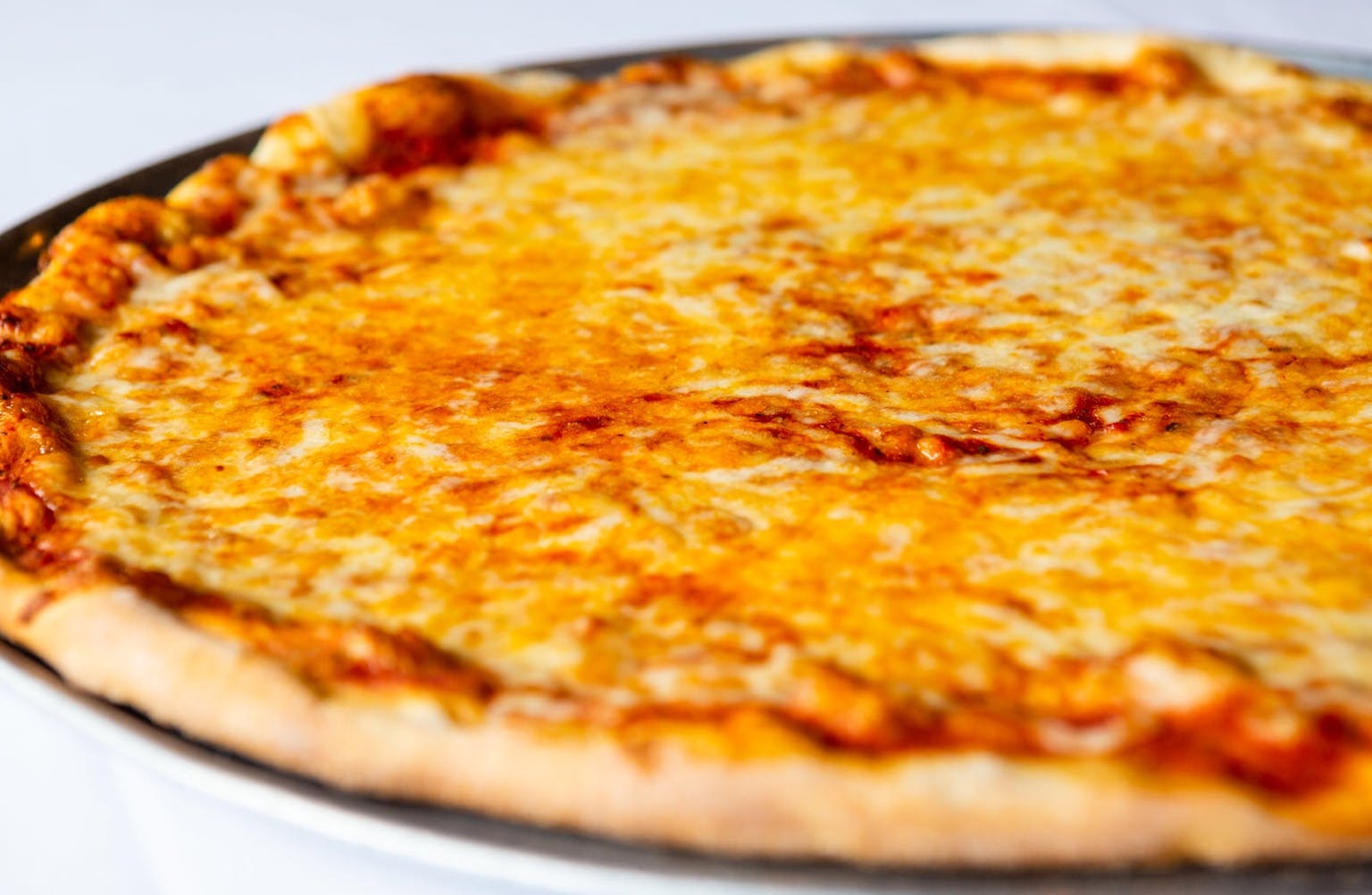 Order Cheese Pizza Slice - Slice food online from Mona Lisa Pizzeria Ristorante store, Bayonne on bringmethat.com
