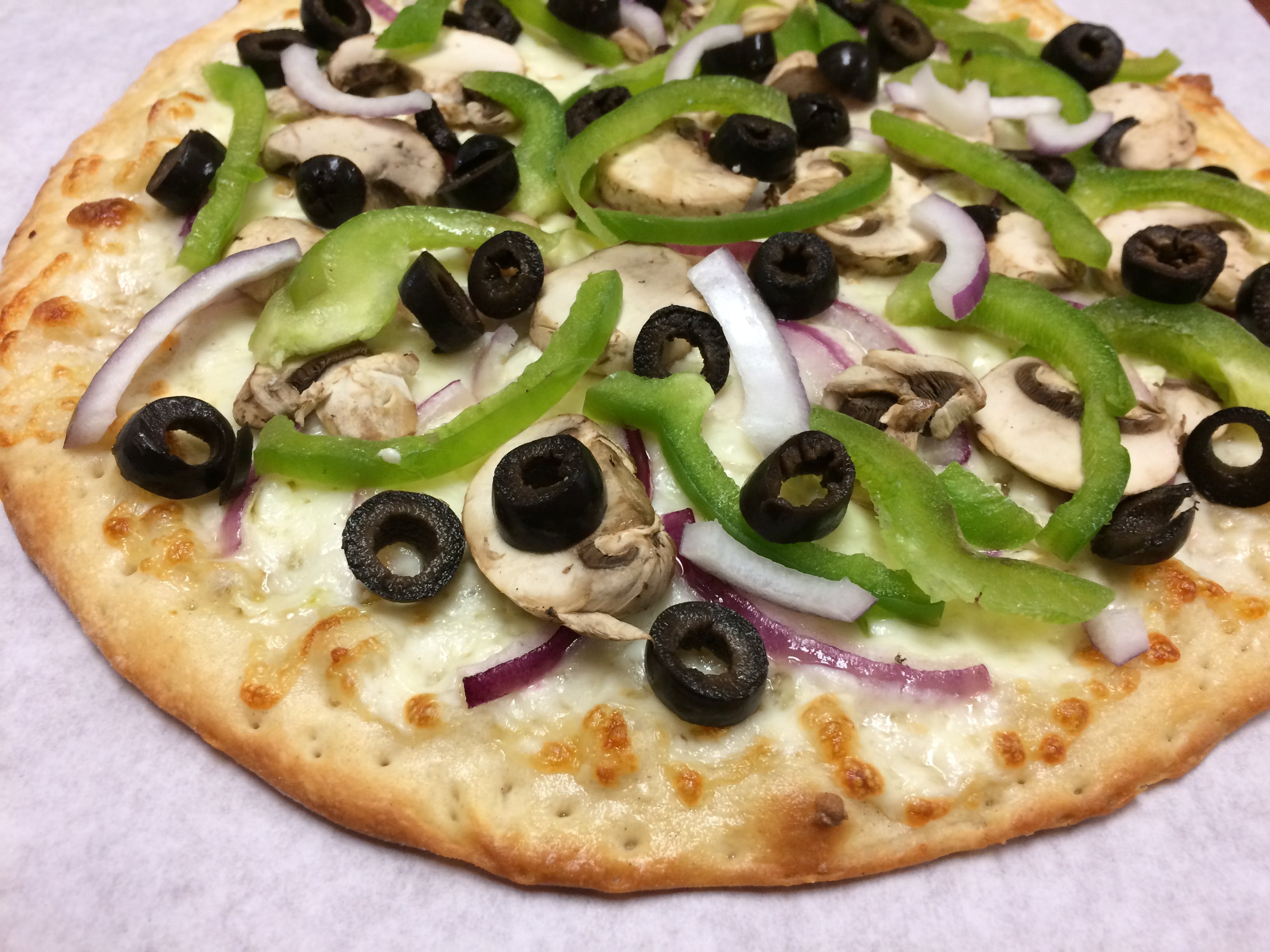 Order Italian Style Veggie Pizza - Small food online from I pizza store, Newark on bringmethat.com
