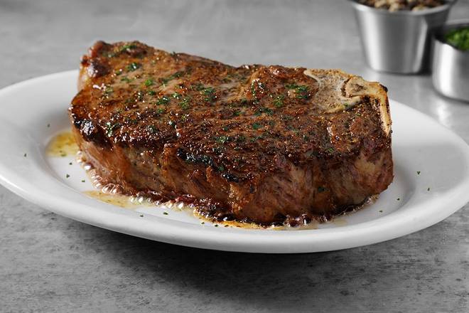 Order BONE-IN NEW YORK STRIP* food online from Ruth Chris Steak House store, Knoxville on bringmethat.com