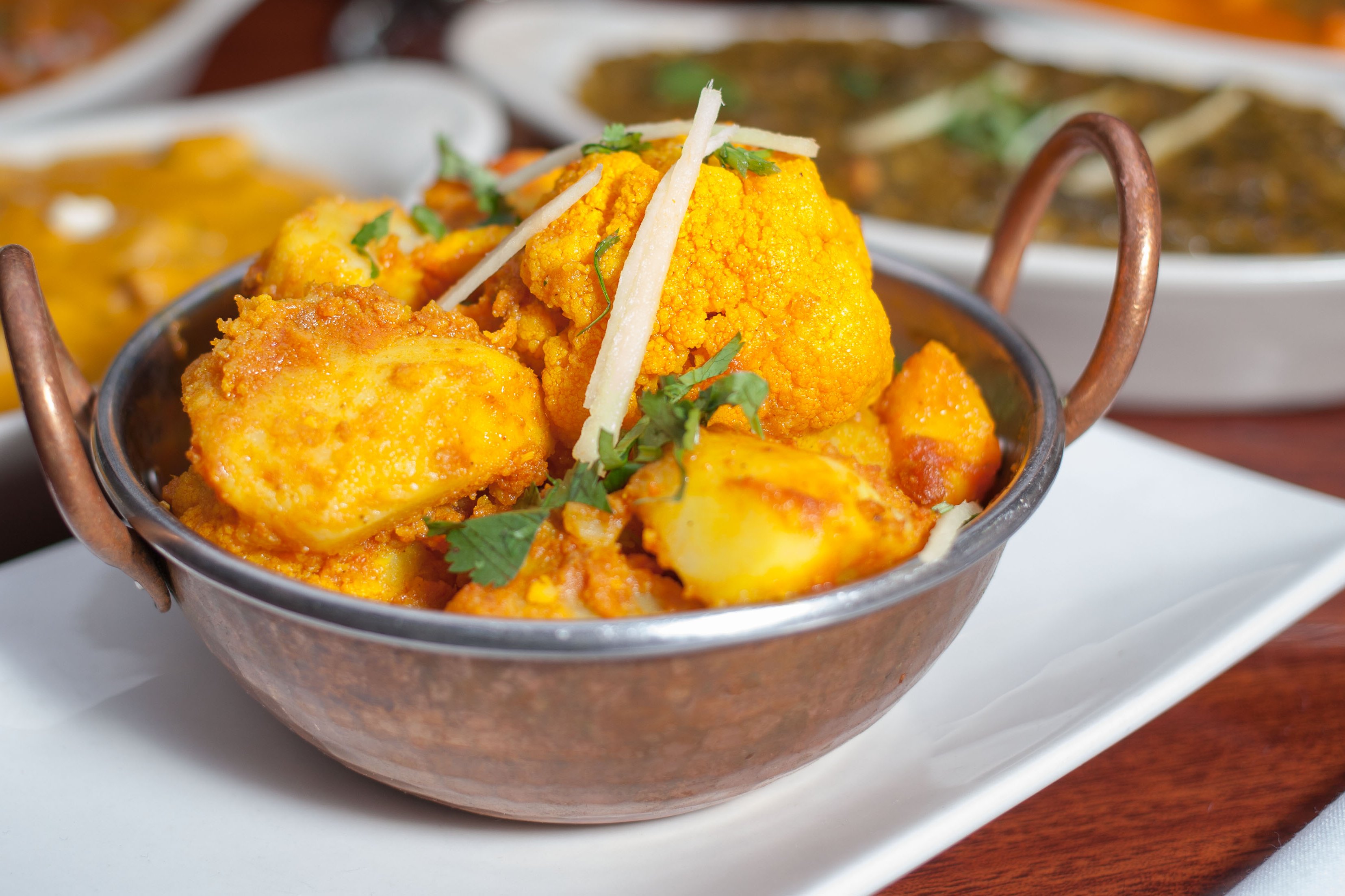 Order Aloo Gobi food online from Om Indian Cuisine store, San Francisco on bringmethat.com